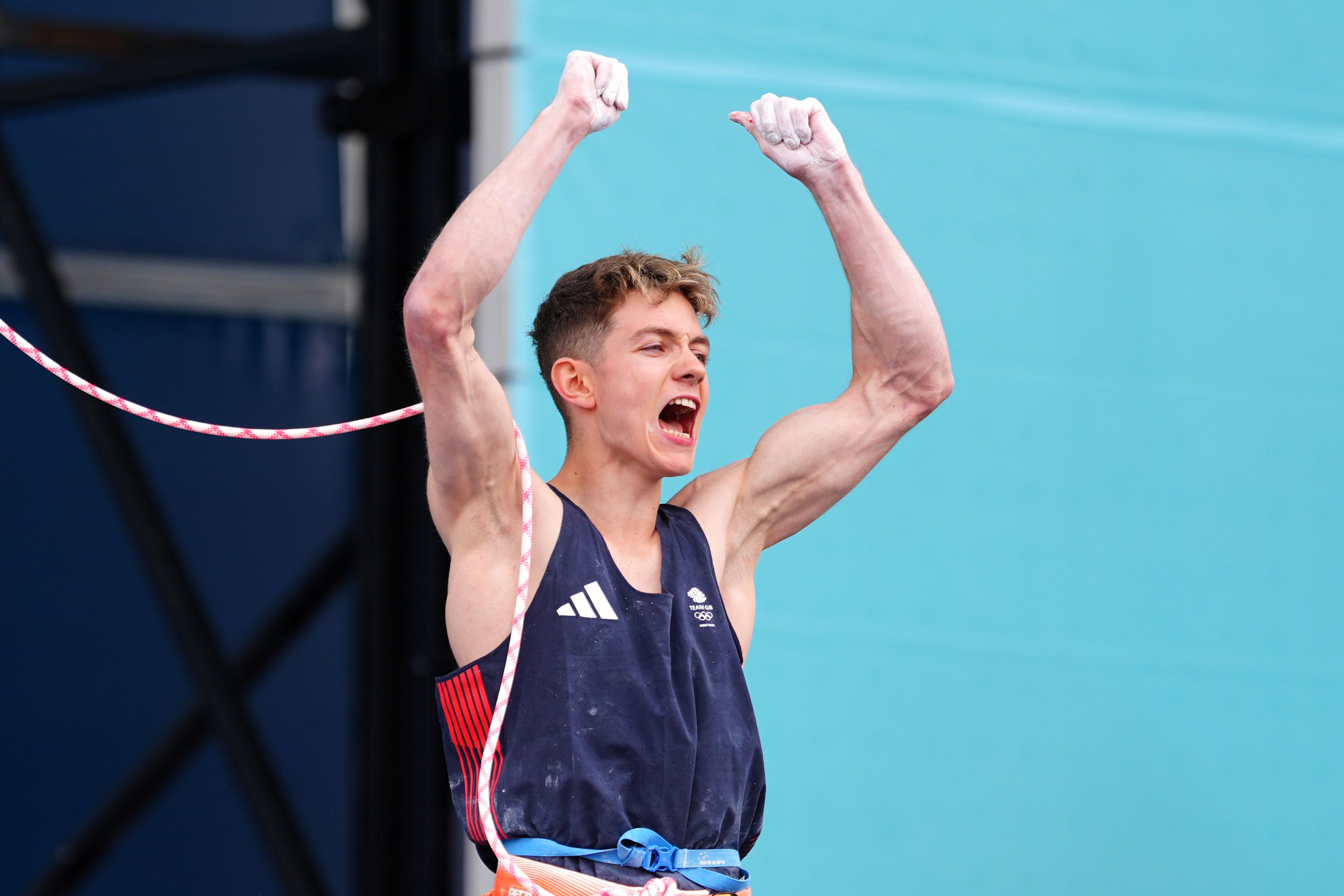 Toby Roberts celebrates winning boulder and lead climbing gold (Peter Byrne/PA)