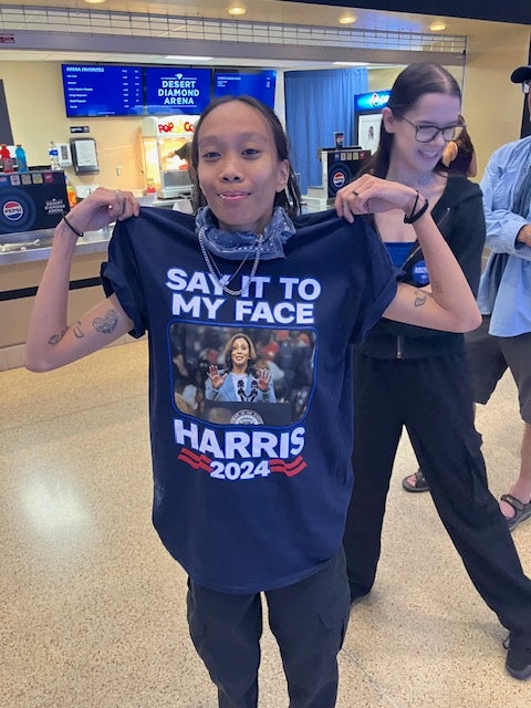 Charlotte Dirige wore a shirt with vice-president Kamala Harris saying ‘say it to my face’ during a rally in Glendale, Arizona