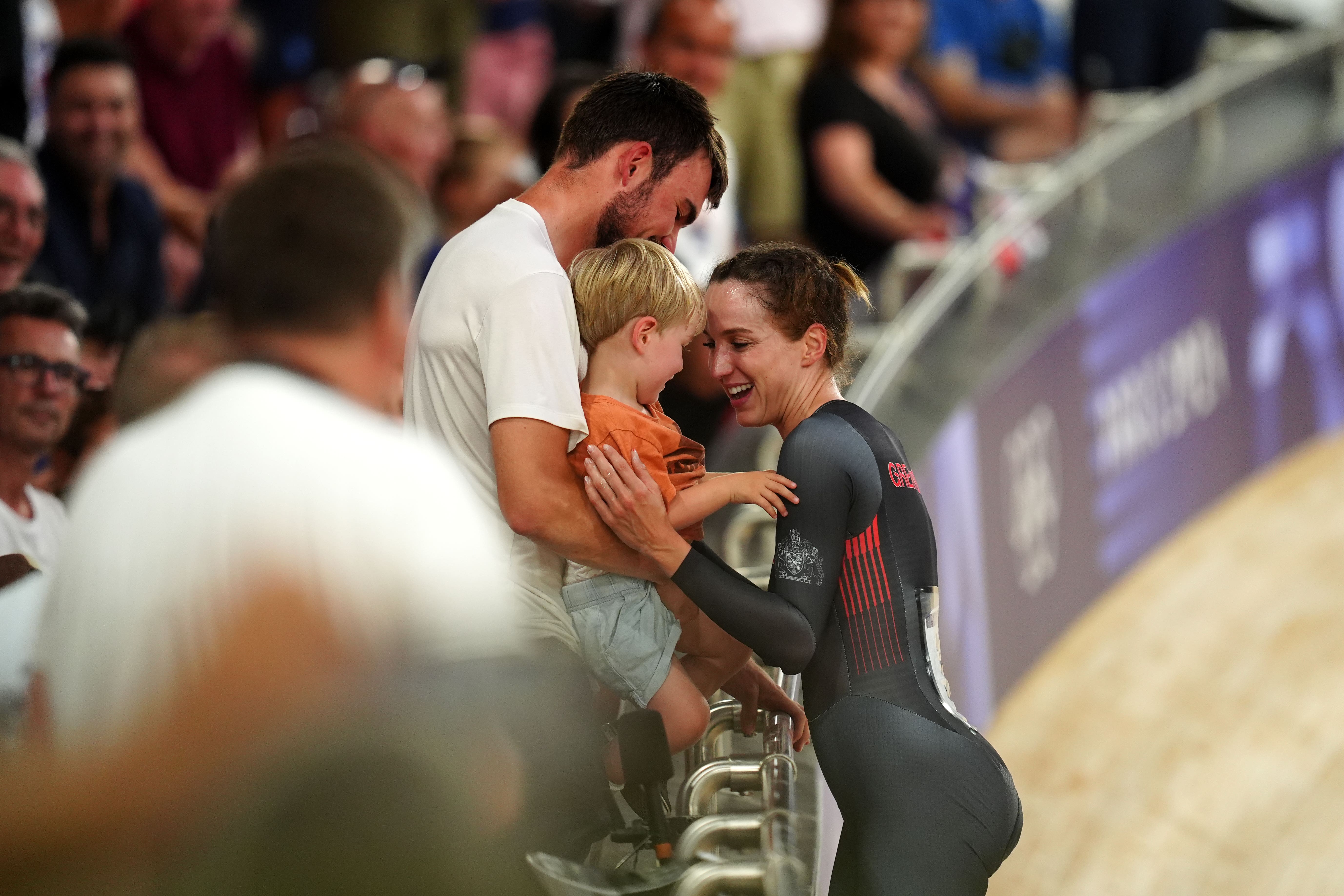 Elinor Barker celebrates with her son and partner, Casper Jopling (David Davies/PA)