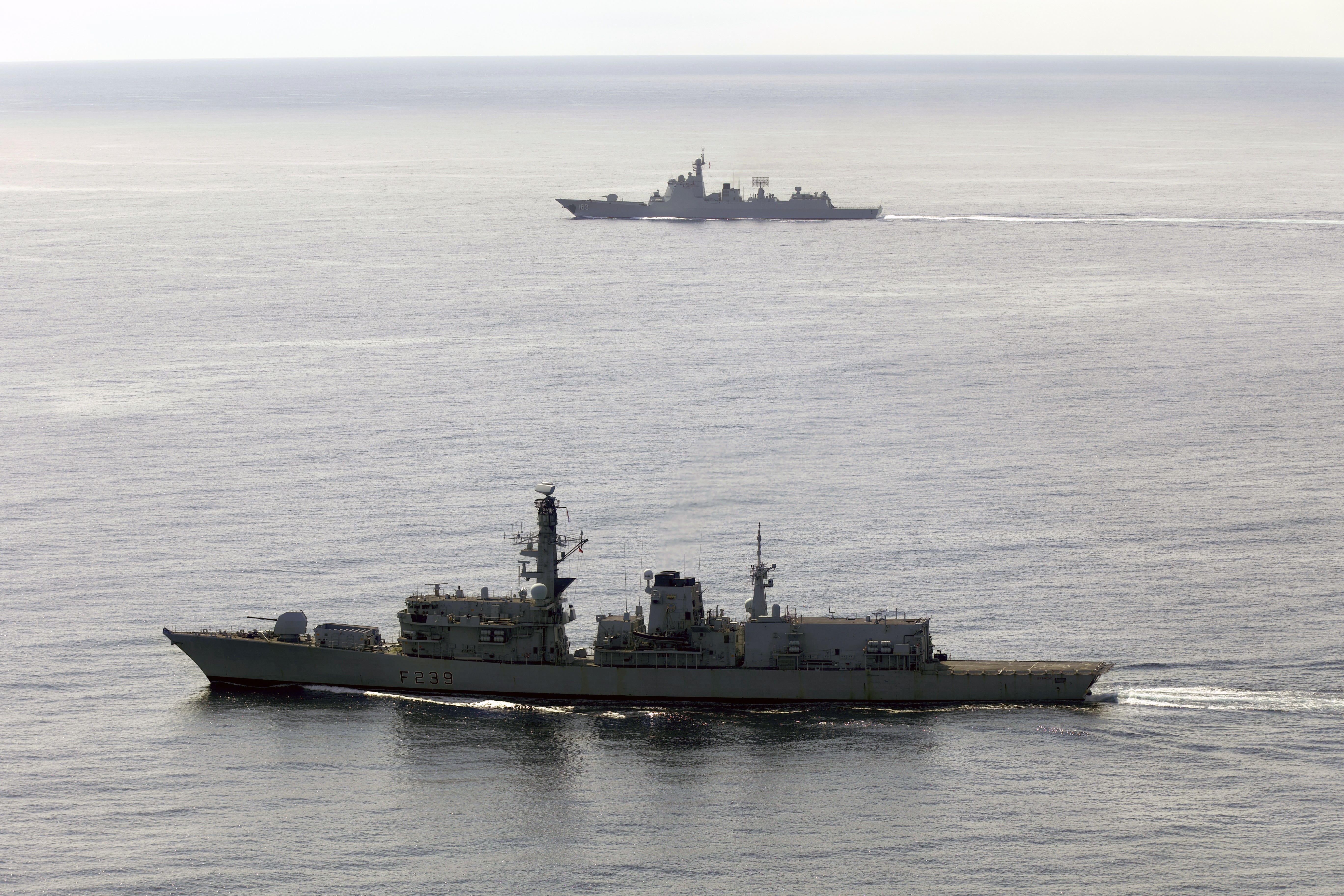 HMS Richmond in the foreground accompanying Chinese destroyer Jiaozuo through the English Channel (Ministry of Defence/PA)