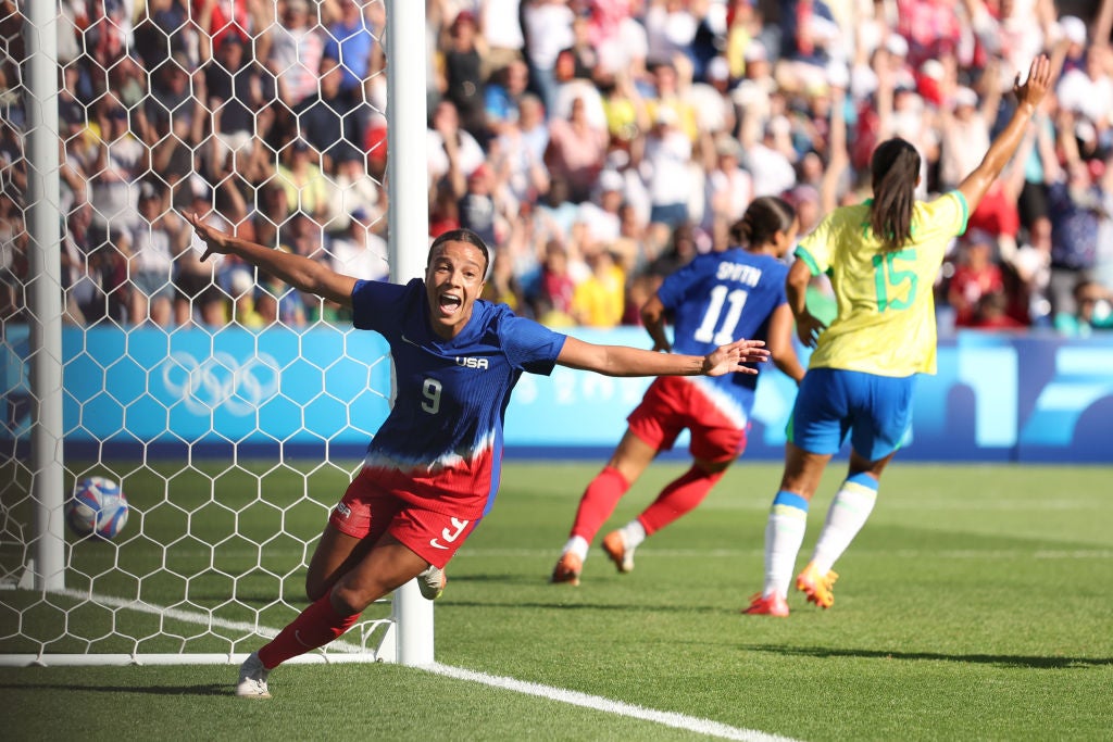 Swanson celebrates scoring the USA’s winner