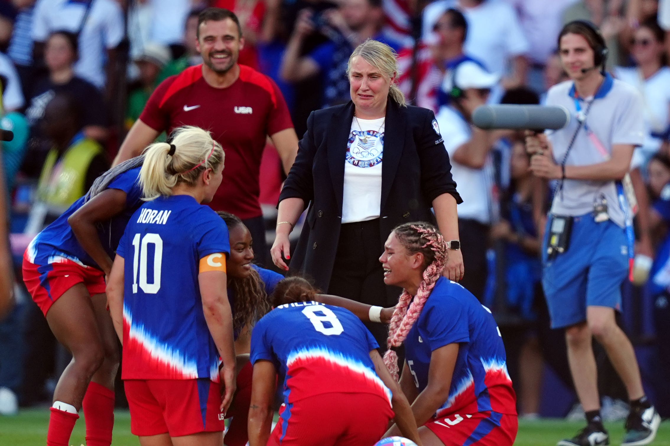 United States manager Emma Hayes with her players following Olympic women’s final victory over Brazil (Mike Egerton/PA)