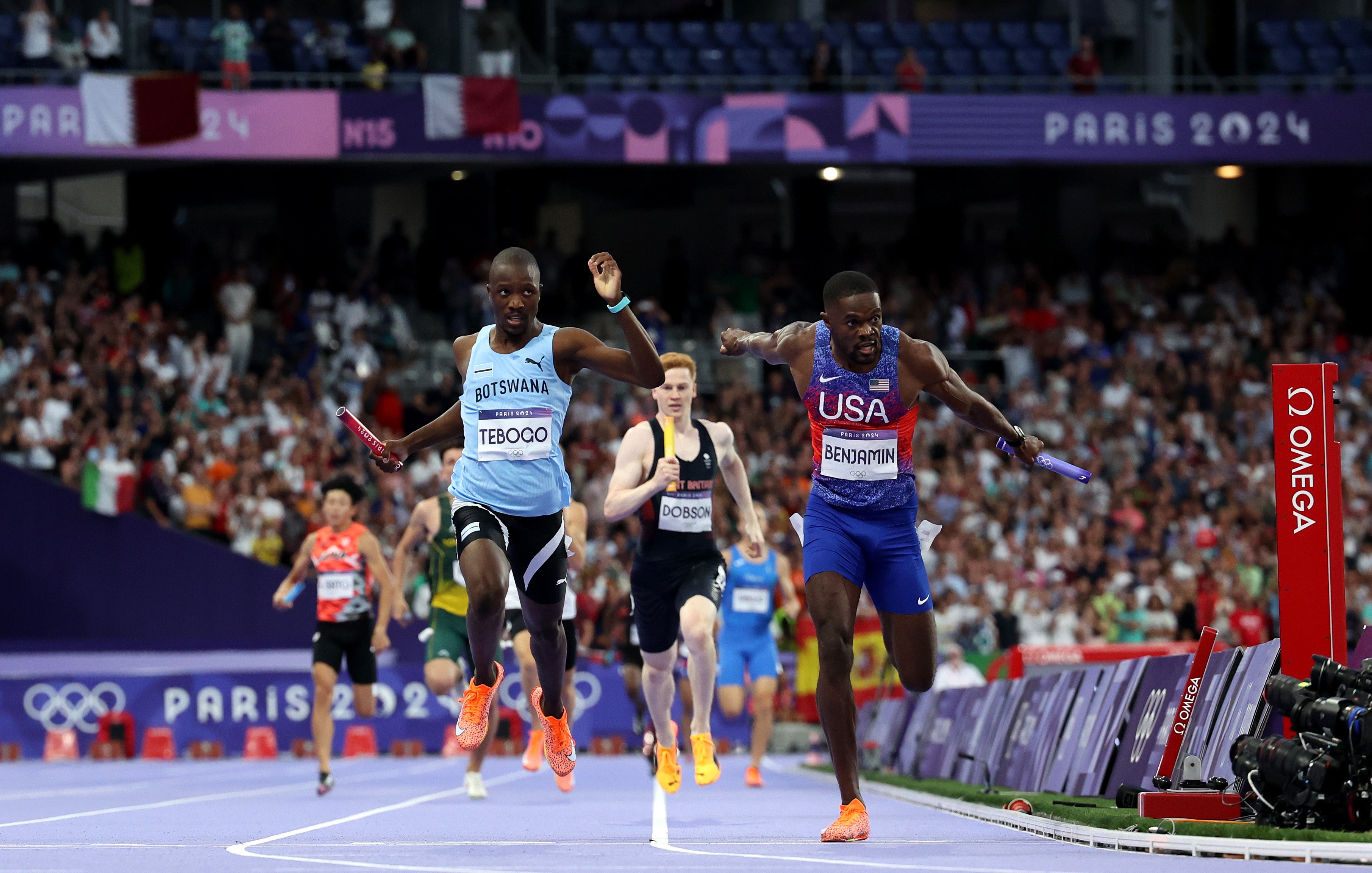 Rai Benjamin of Team United States celebrates winning the Gold medal ahead of silver medalist Letsile Tebogo of Team Botswana