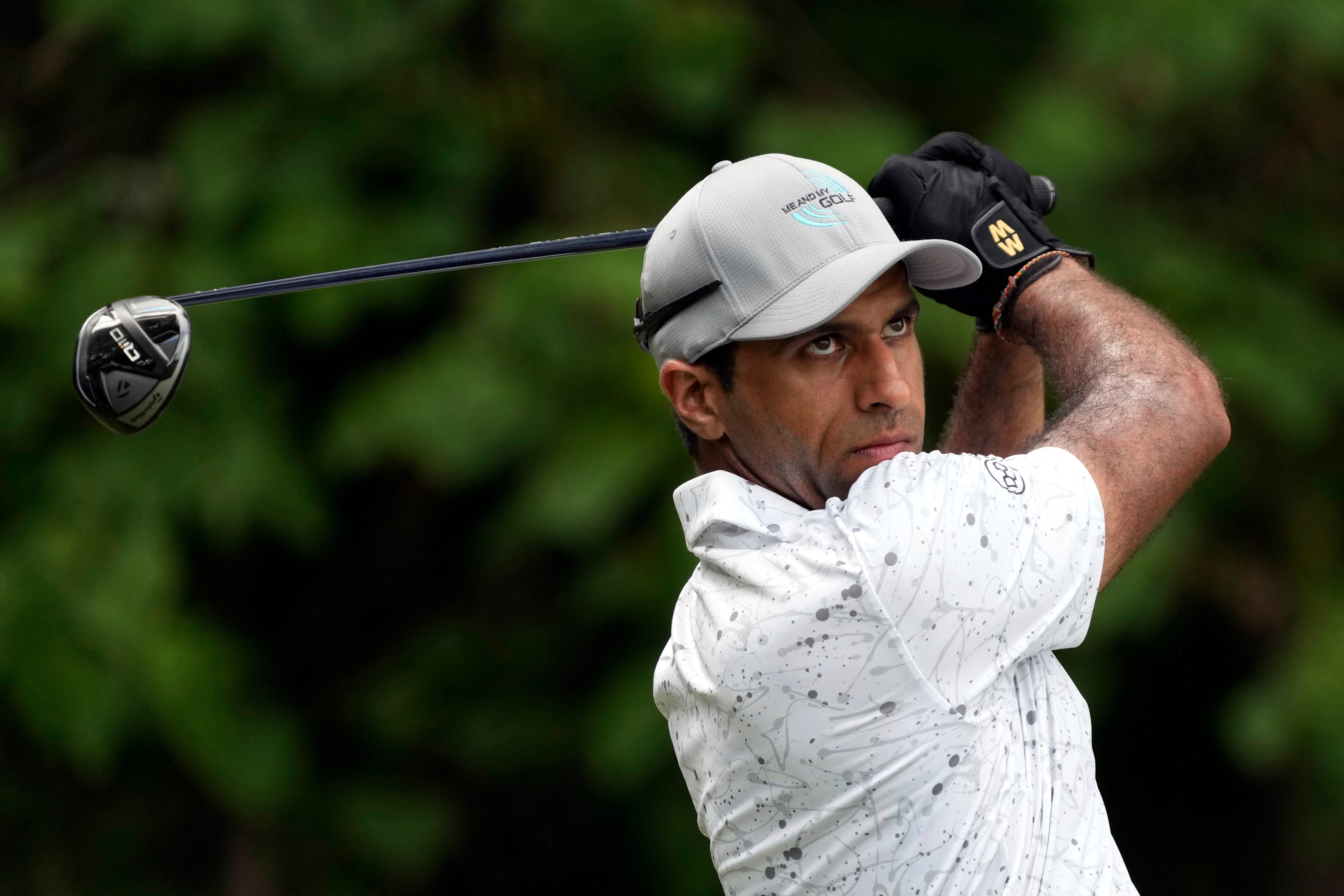 Aaron Rai watches his tee shot on the second hole (Chuck Burton/AP)