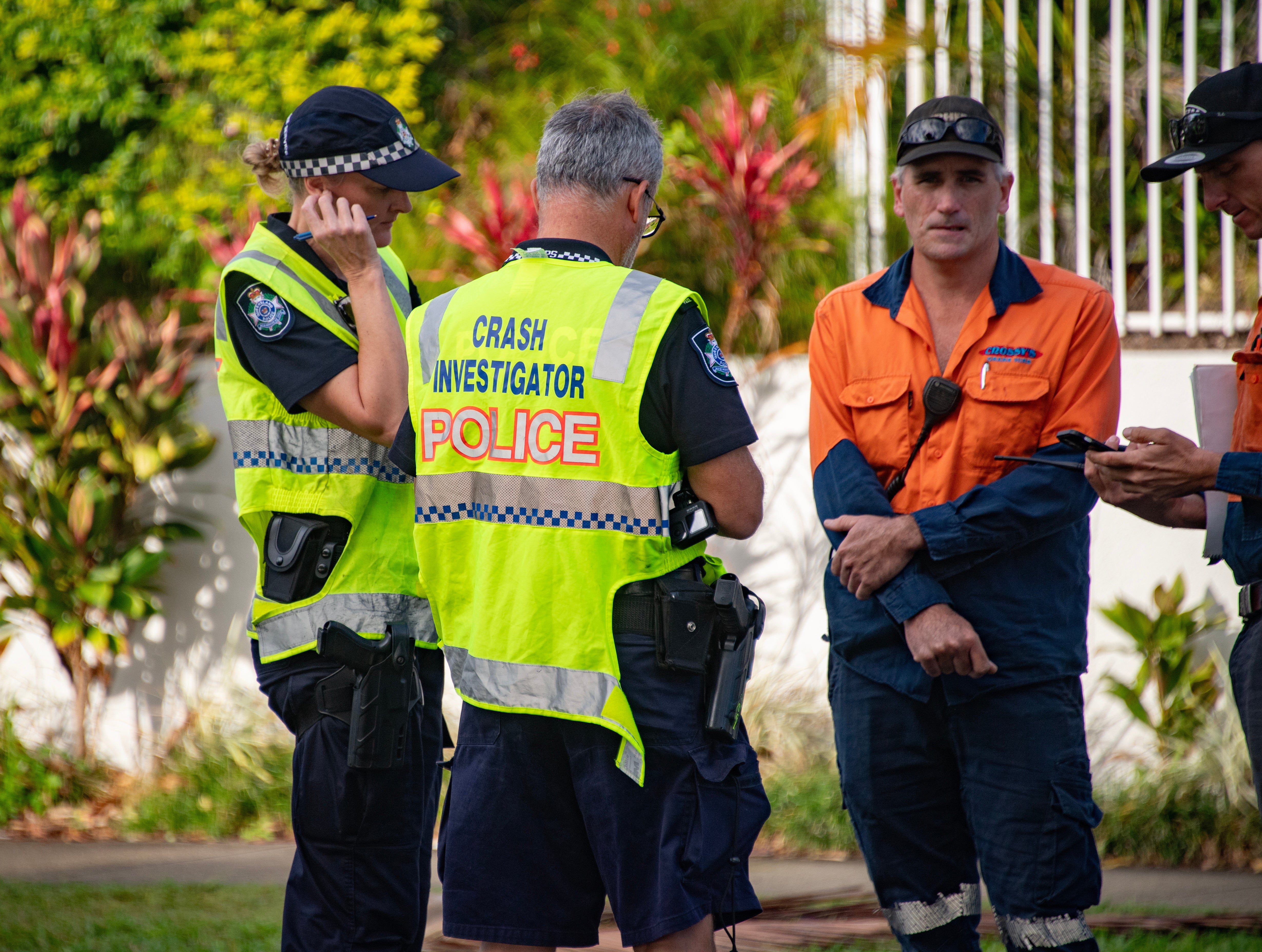 Emergency services work at the Double Tree by Hilton Hotel after helicopter crash