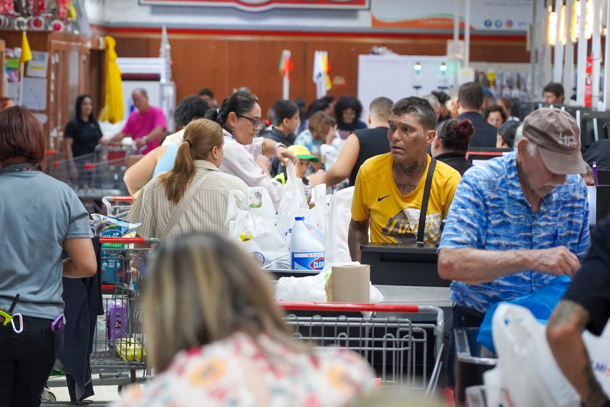 Puerto Rico residents rushed to grocery stores on Tuesday ahead of Tropical Storm Ernesto.