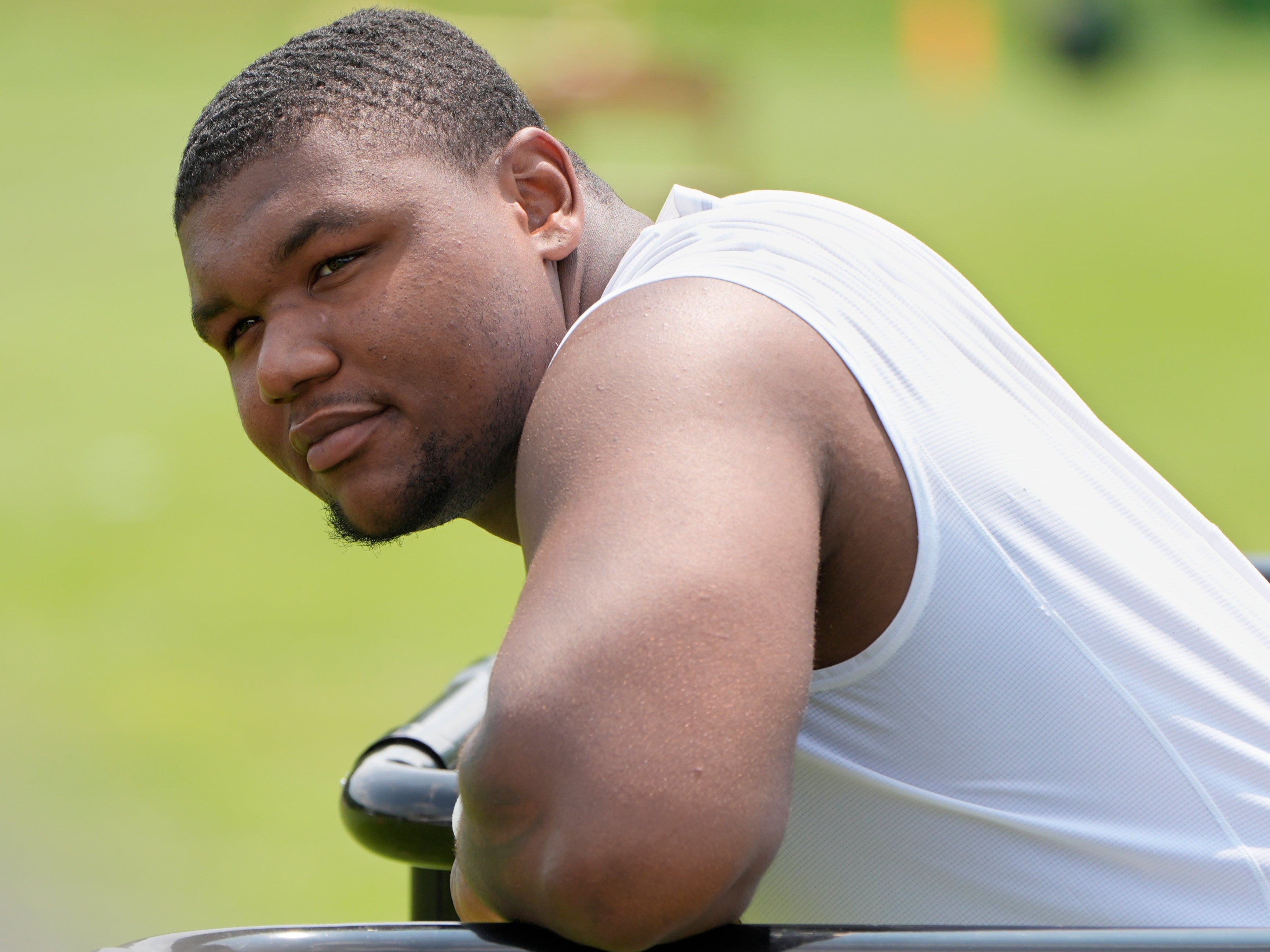 Cleveland Browns defensive tackle Mike Hall Jr. waits for his turn to speak at a news conference during an NFL football training camp practice Saturday, July 27, 2024, in White Sulphur Springs, West Virginia. Hall was arrested on August 13, 2024 and charged with domestic violence after he allegedly threatened his fiancé with a gun during an argument