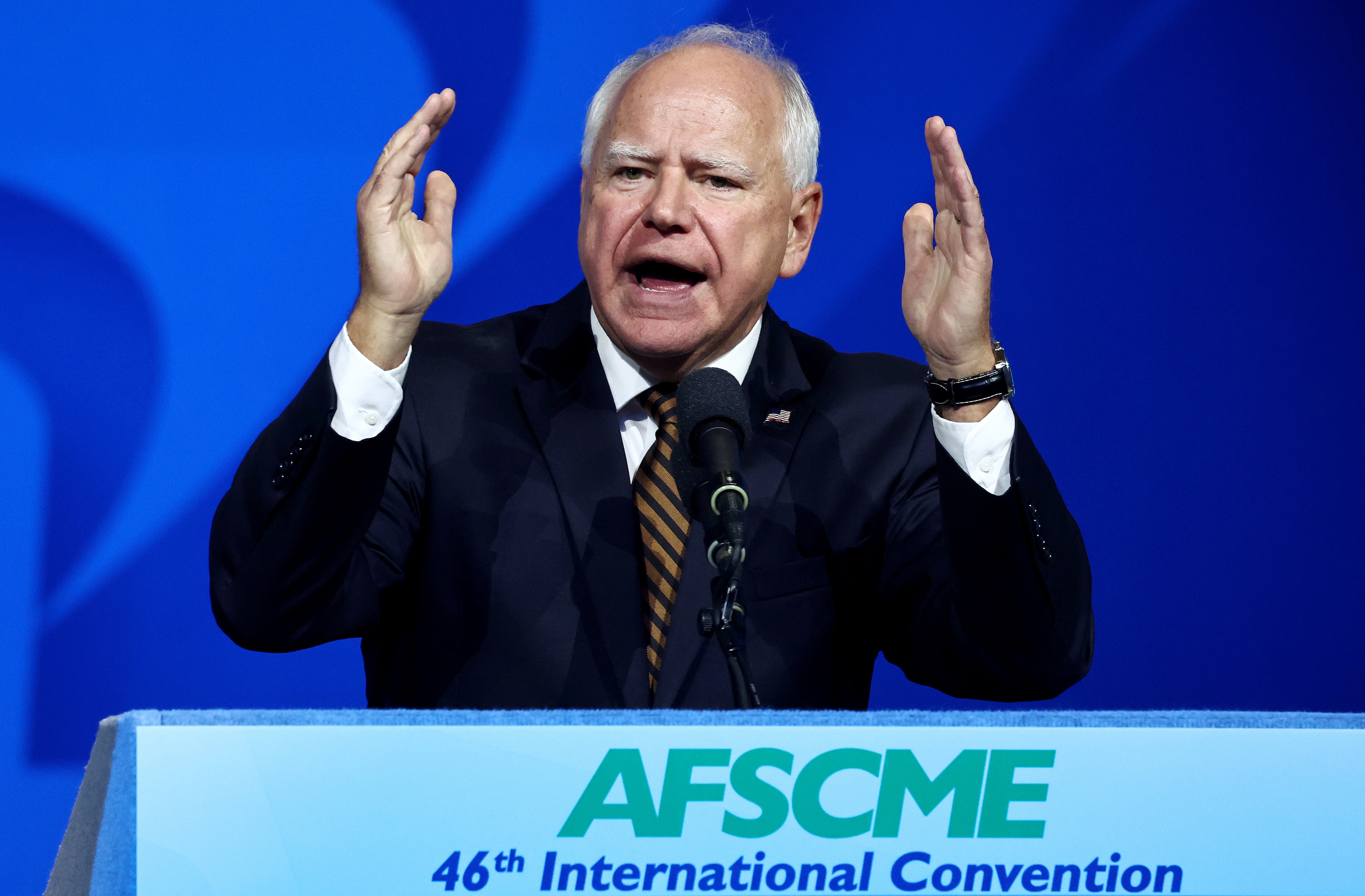 Democratic vice presidential candidate Minnesota governor Tim Walz defends his military record at the 46th International Convention of the American Federation of State