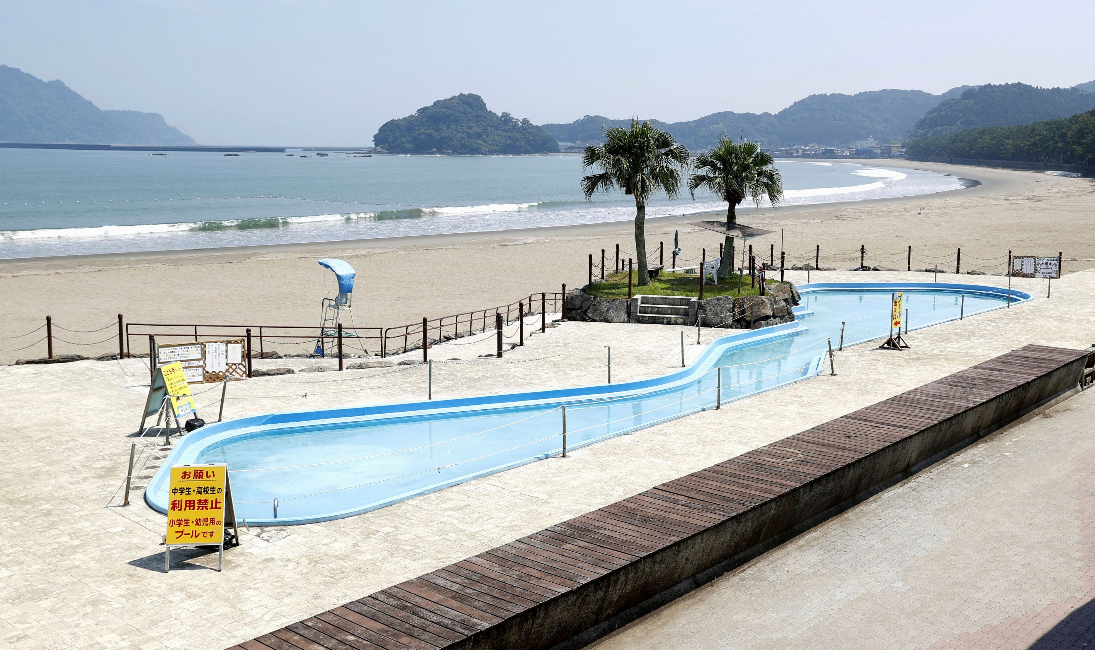 A beach is deserted after swimming was prohibited as the megaquake advisory was issued in Nichinan