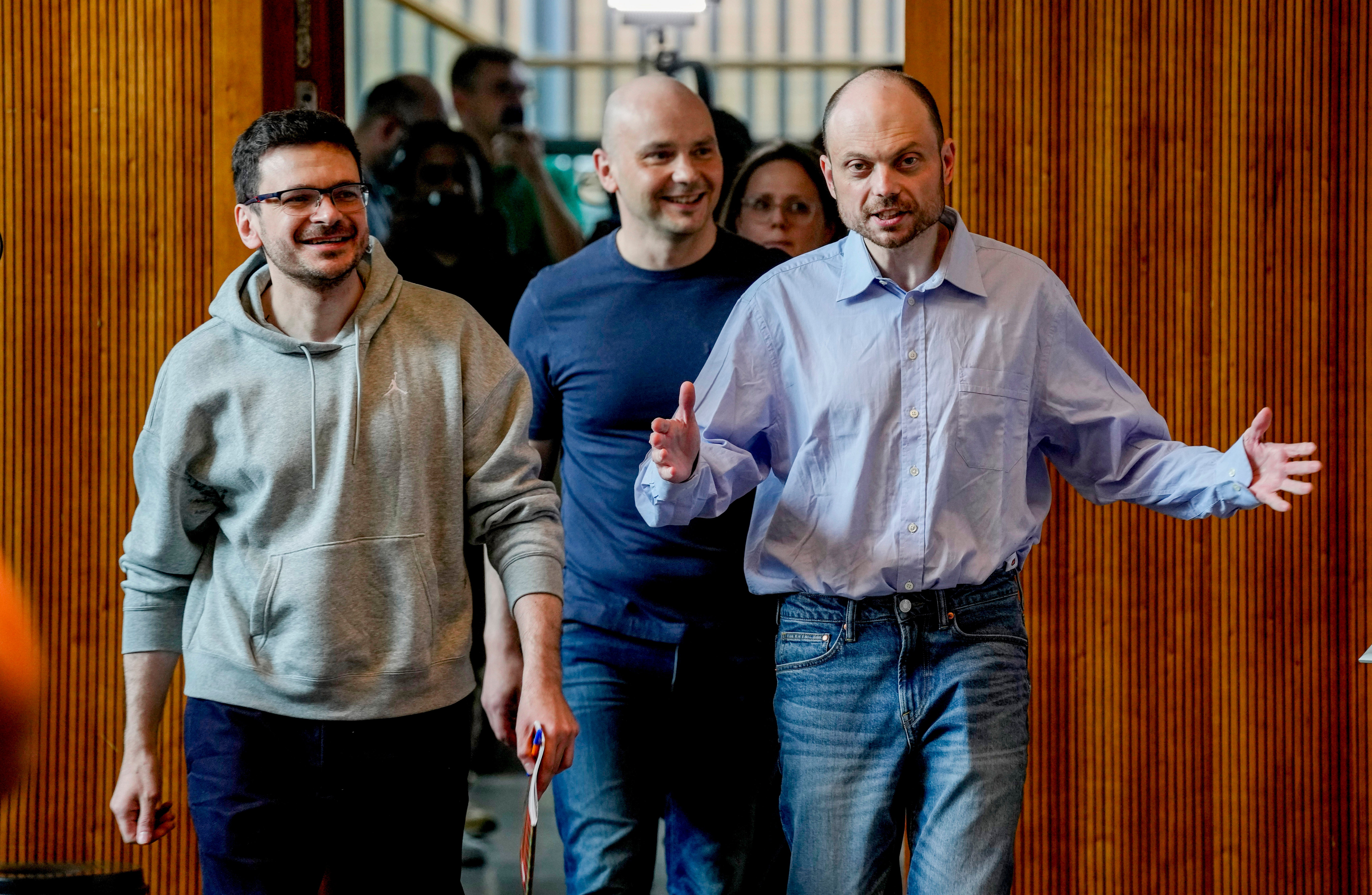 Freed Russian prisoners Ilya Yashin, Andrei Pivovarov and Vladimir Kara-Murza, from left, enter a news conference in Bonn, Germany, on Aug. 2, 2024, a day after they were released as part of an East-West prisoner swap