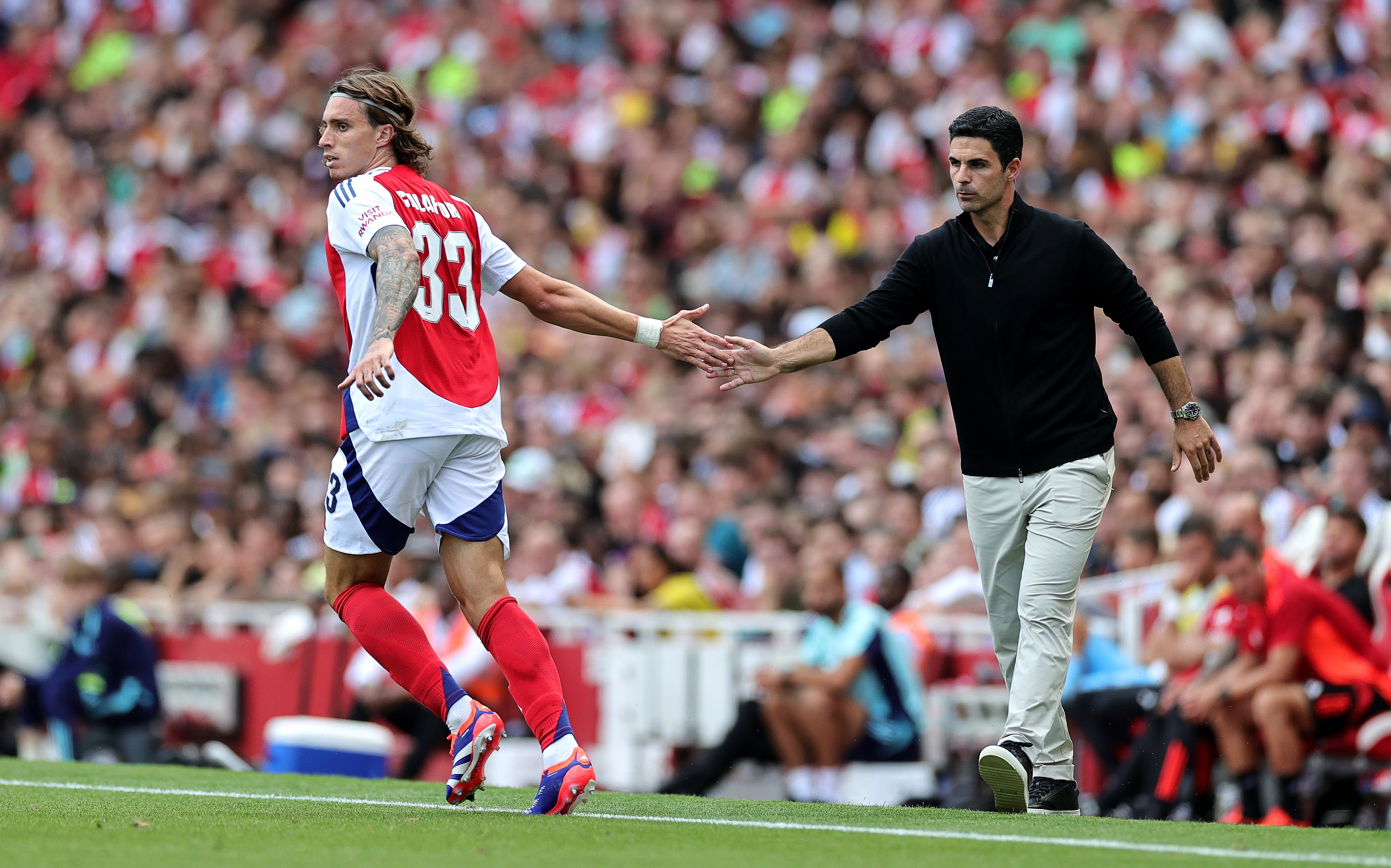 Arteta with new signing, defender Riccardo Calafiori