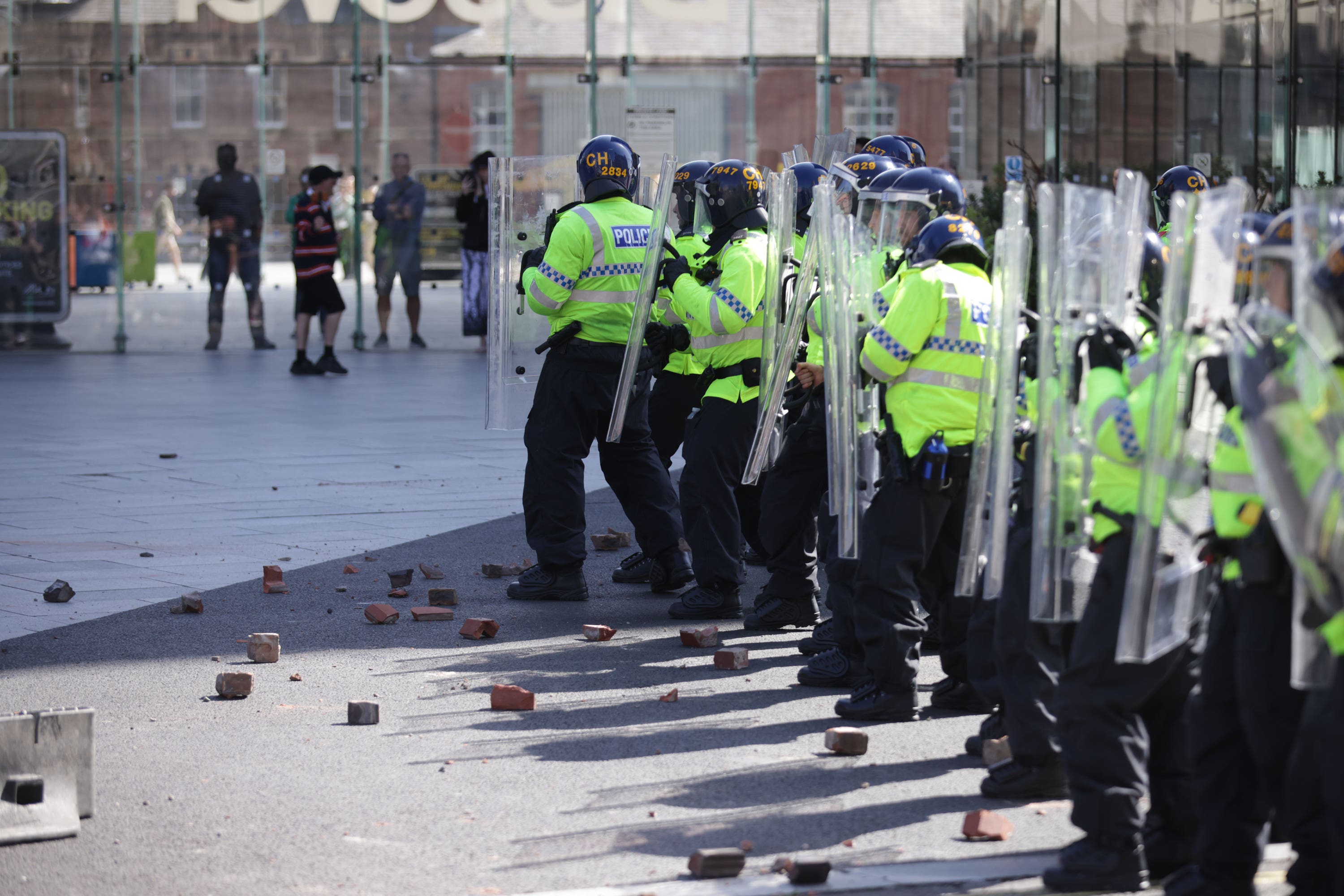 Some 372 adults have now been charged in connection with the recent disorder, including 31 by Merseyside Police (James Speakman/PA)