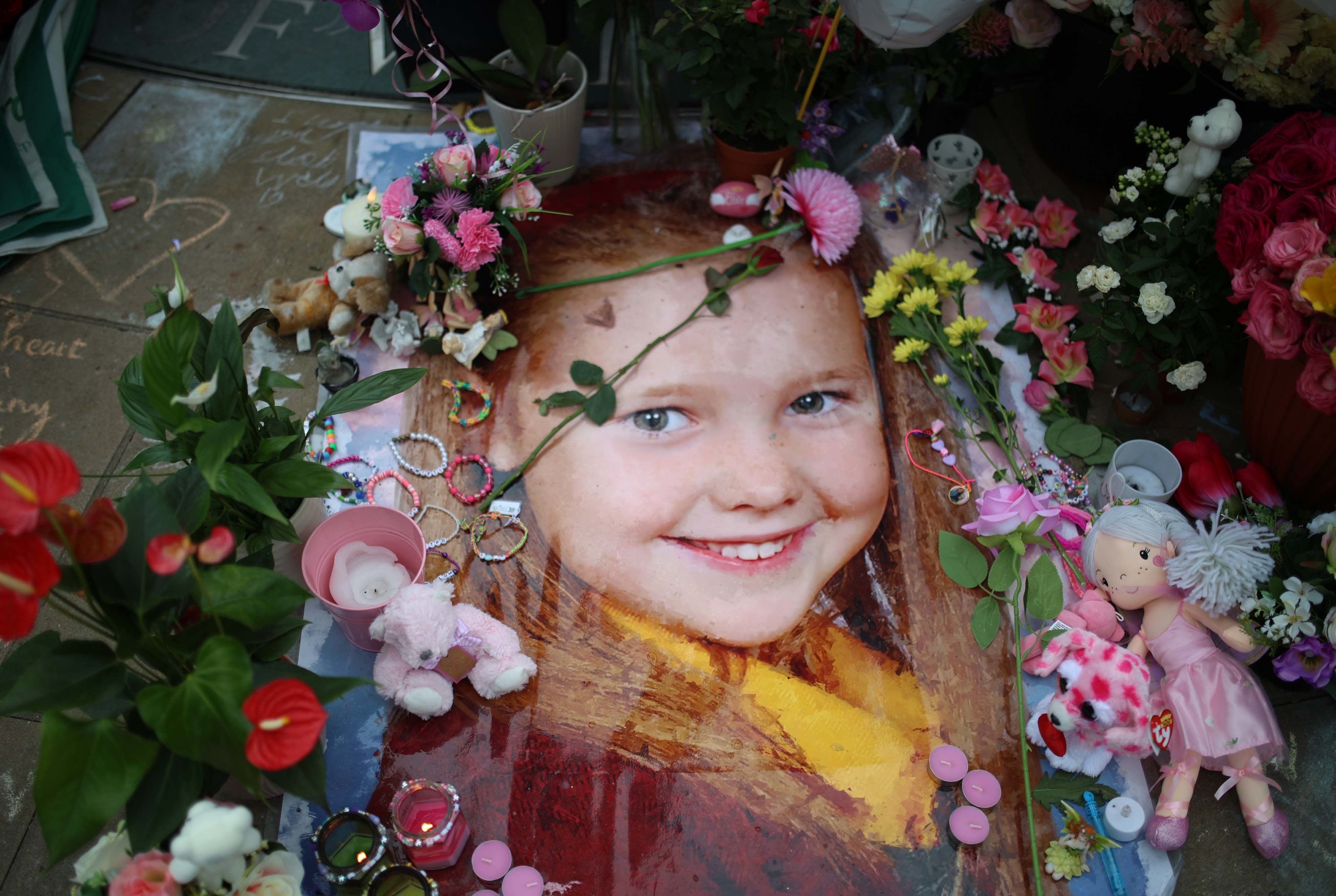 A floral tribute to Elsie Dot Stancombe left outside the Town Hall in Southport (Ryan Jenkinson/PA)