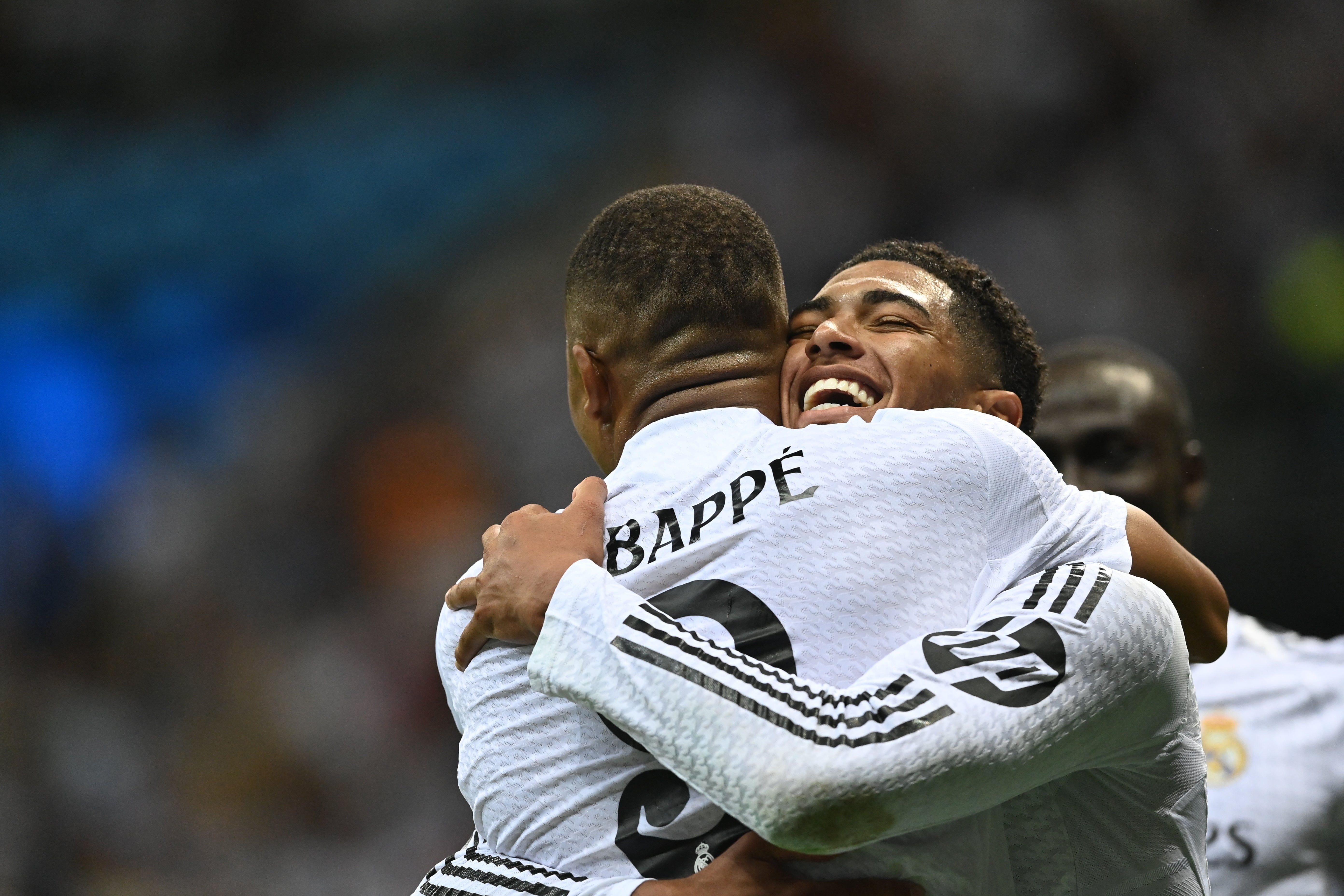 Kylian Mbappe (front) of Real Madrid with teammate Jude Bellingham (back) celebrate