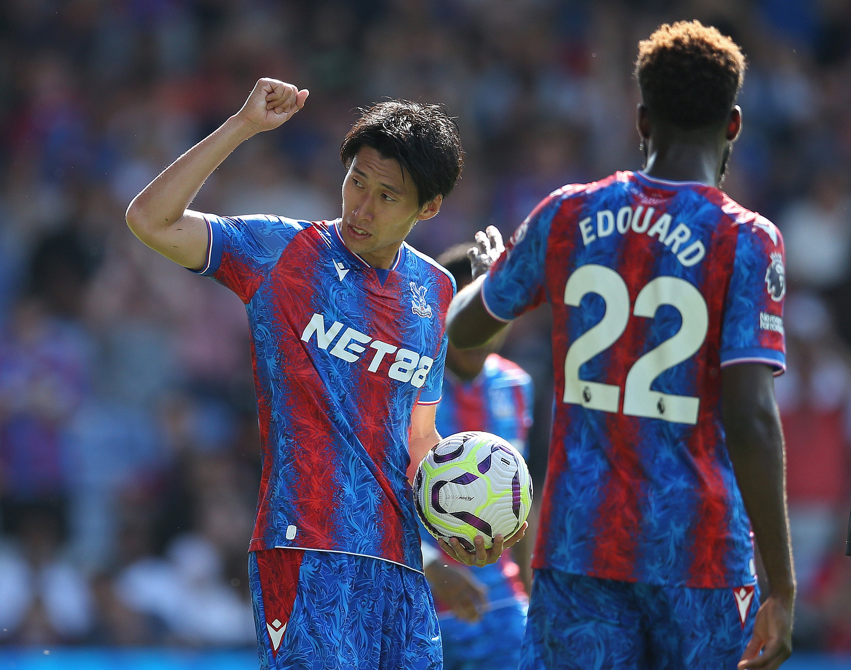 Daichi Kamada of Crystal Palace (L) celebrates after scoring the 1st goal during the pre-season match between Crystal Palace and FC Nantes