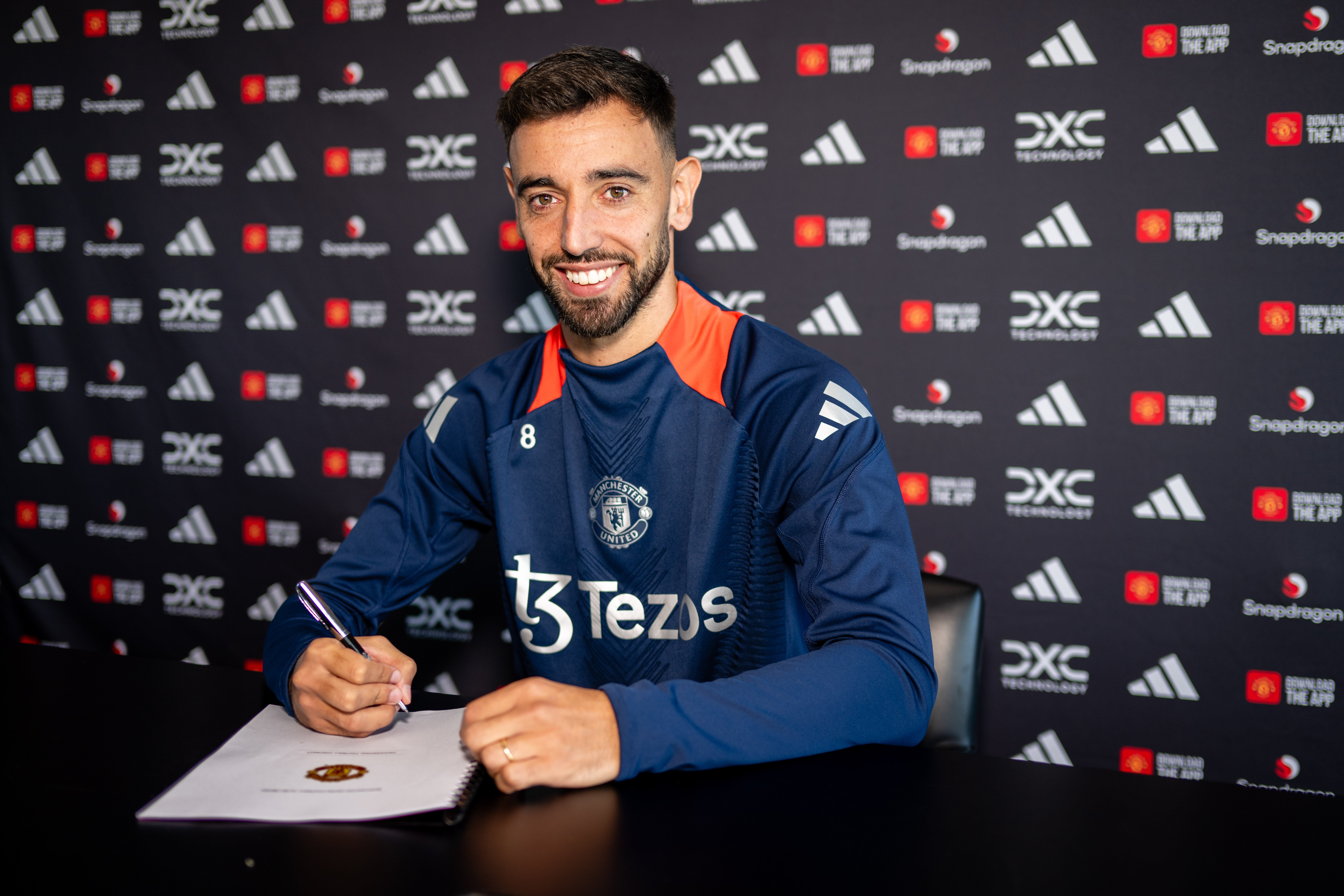 Bruno Fernandes of Manchester United poses after signing a new deal