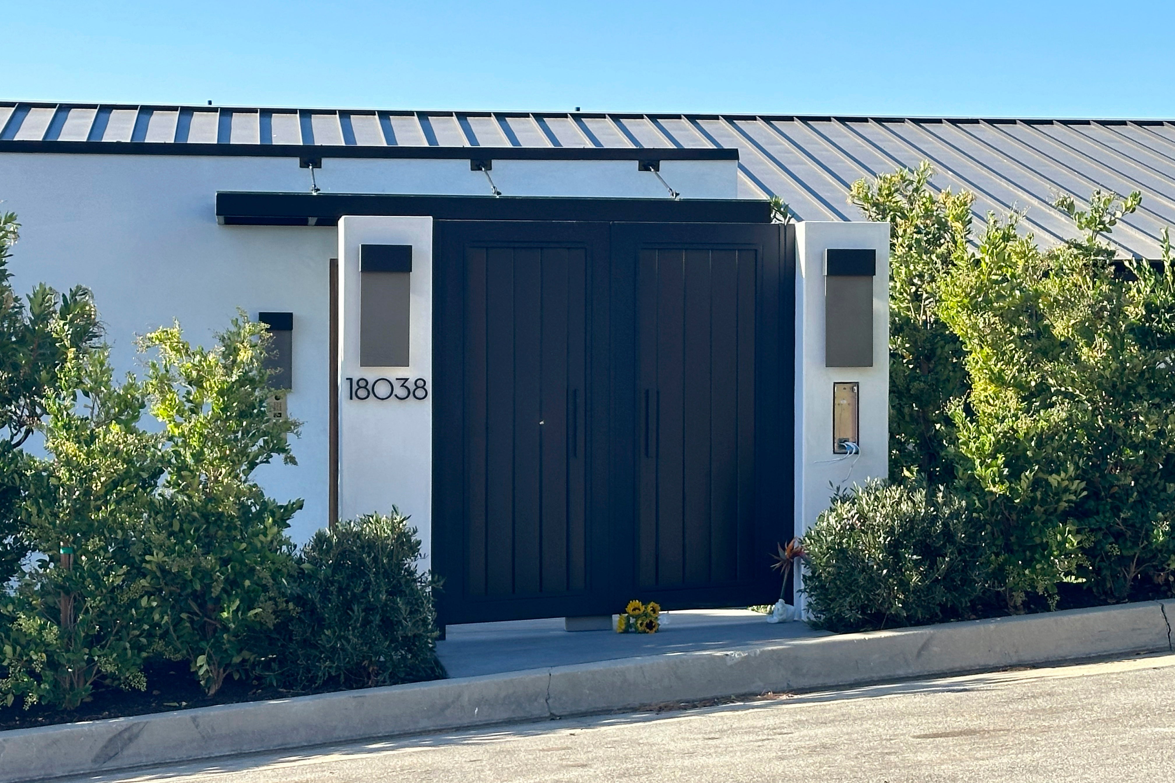 Flowers were placed outside the home of actor Matthew Perry in Los Angeles on October 29, 2023, a day after his death