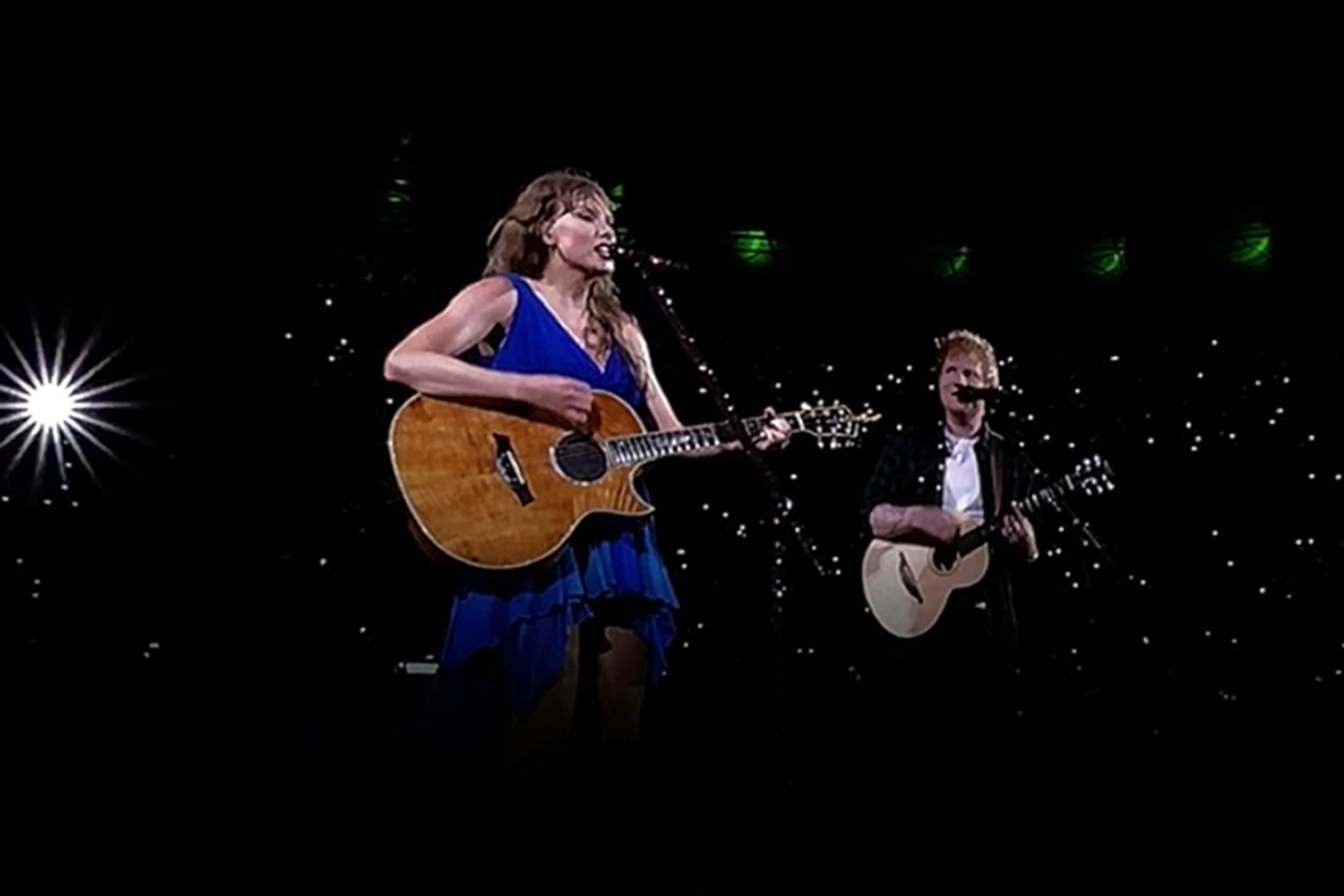 Taylor Swift performs on stage with surprise guest Ed Sheeran as her Eras Tour concert returns to Wembley Stadium (Natasha Leake/PA)