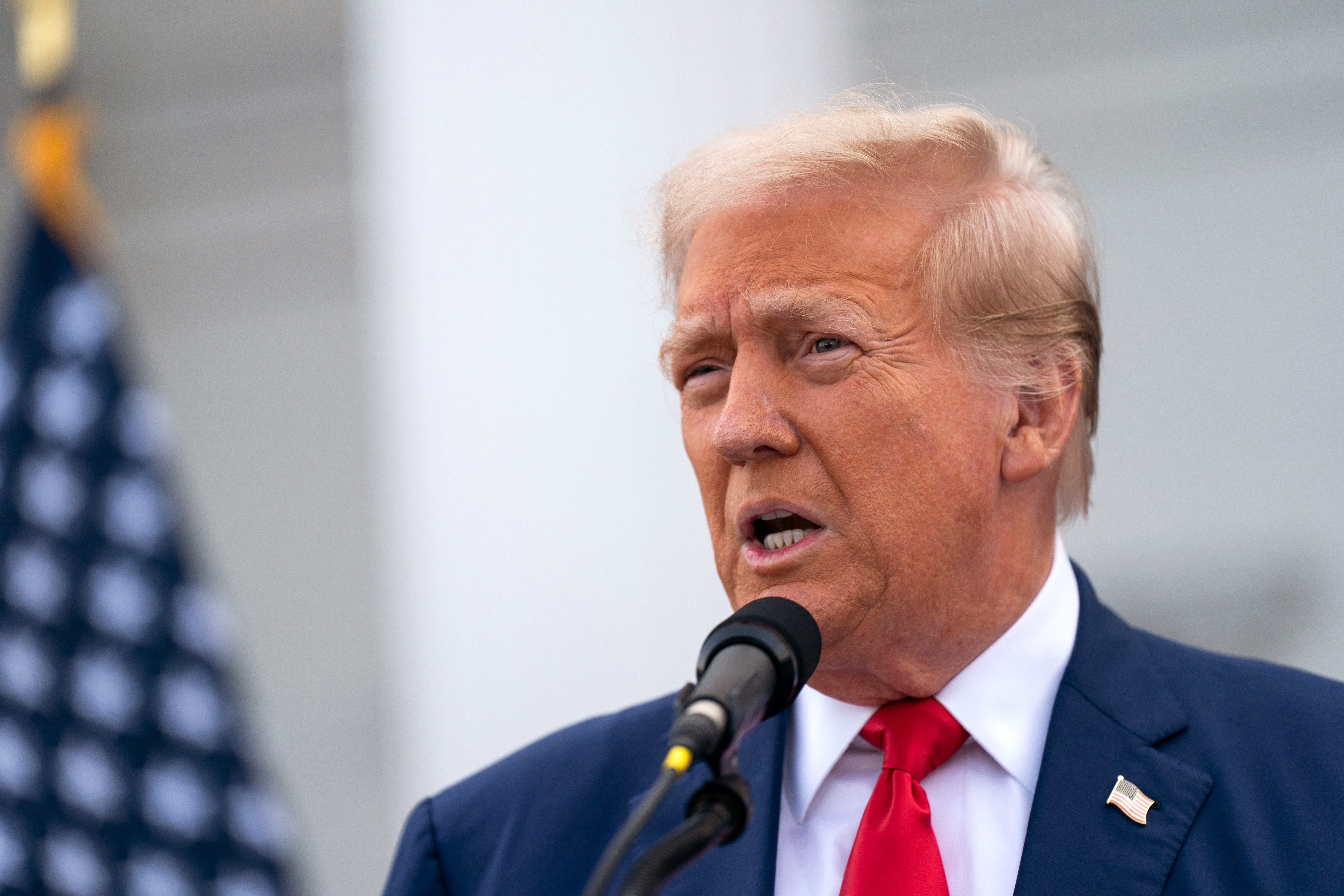 Donald Trump holds a news conference outside the Trump National Golf Club Bedminster on August 15, in Bedminster, New Jersey. He has championed removing taxes on tips