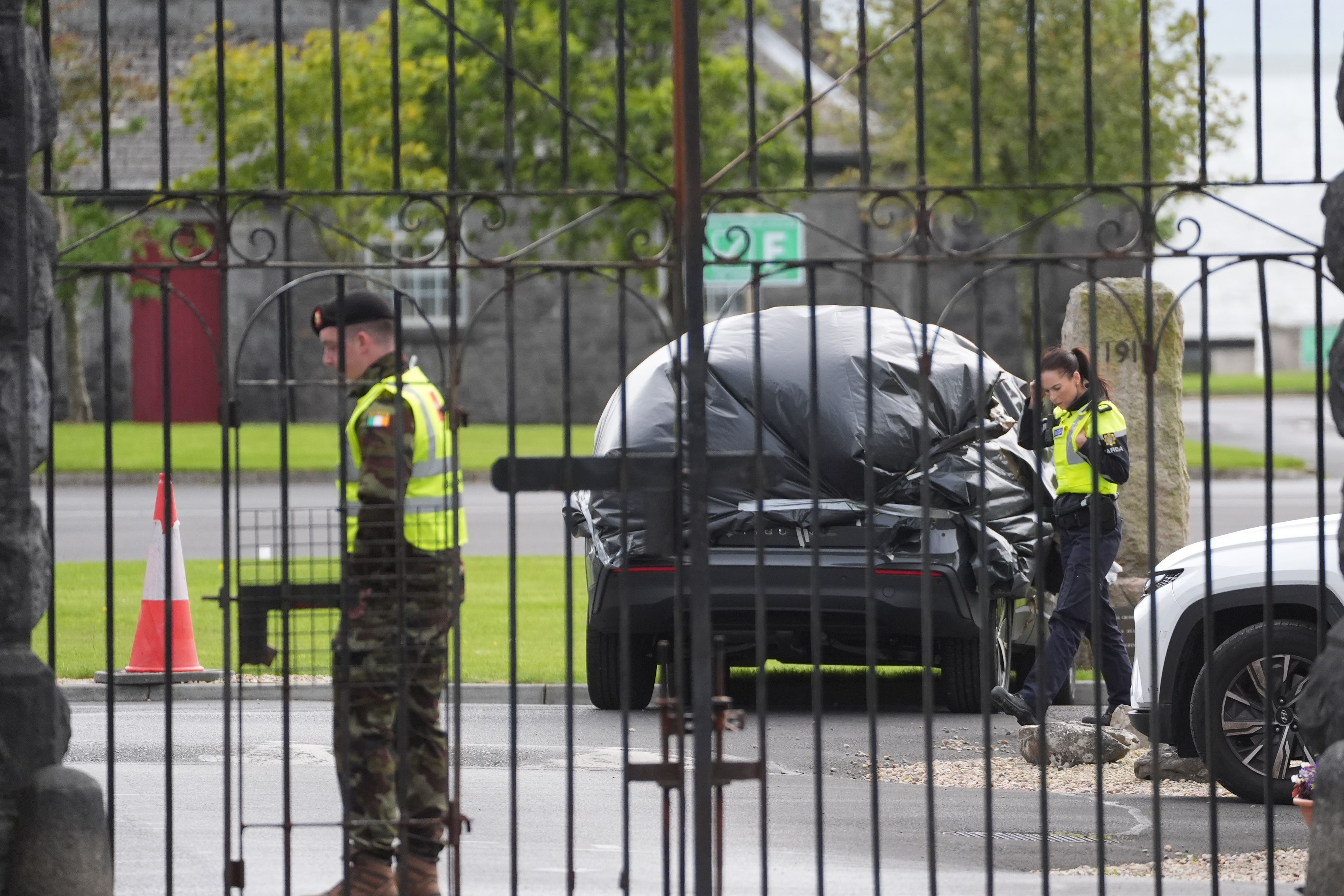 A car wrapped in plastic at the scene at Renmore Barracks in County Galway after army chaplain Father Paul Murphy was stabbed (Brian Lawless/PA)