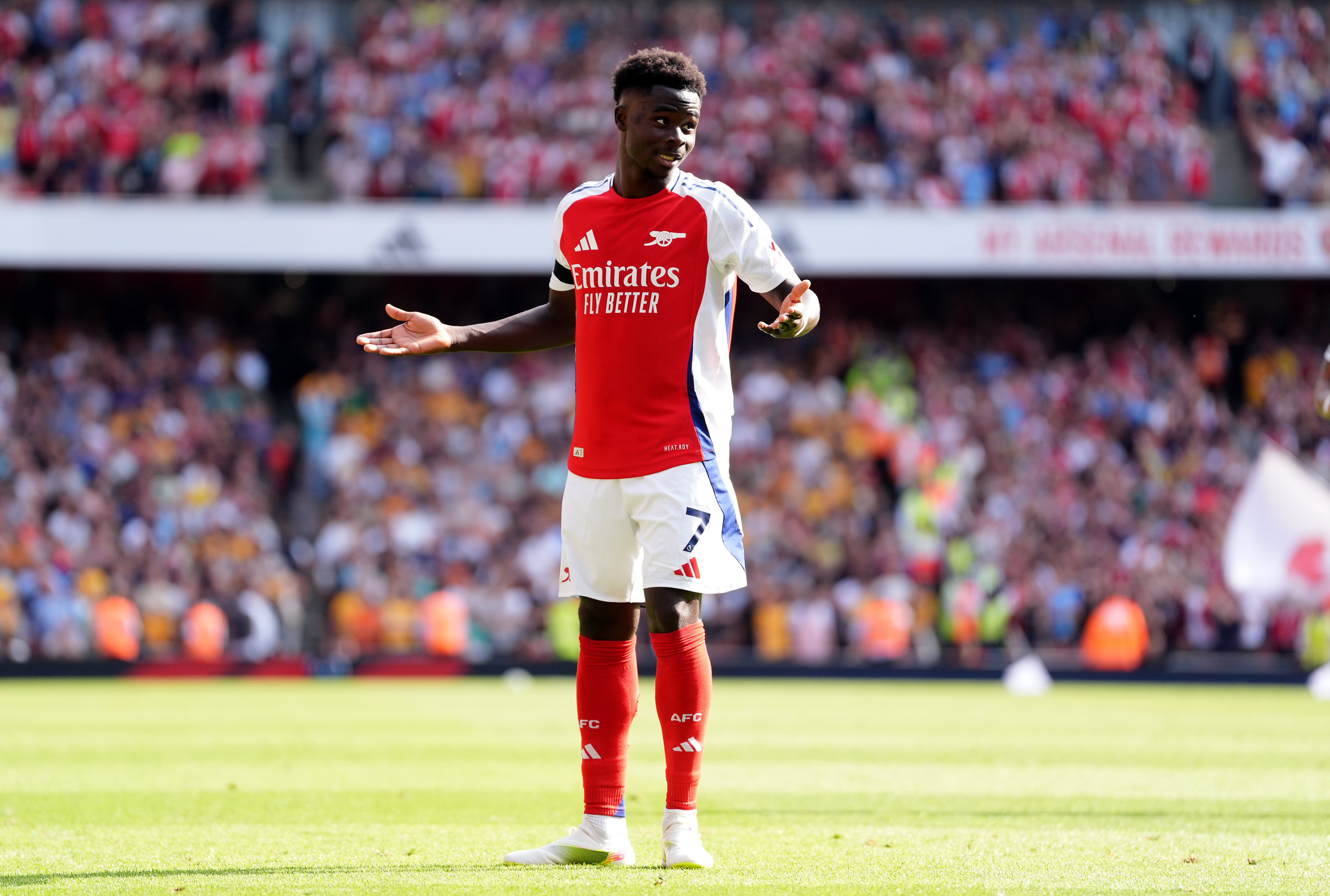 Bukayo Saka celebrates his goal against Wolves