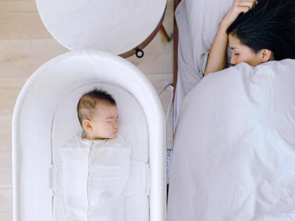 A child sleeping in a Snoo bassinet. The Snoo bassinet is equipped with sensors to track a baby’s sleep, a self-rocking feature, and requires the infant to be strapped in to help prevent SIDS. Happiest Baby, which makes the Snoo, recently changed its pricing structure, locking some of its features behind a $20 per month subscription