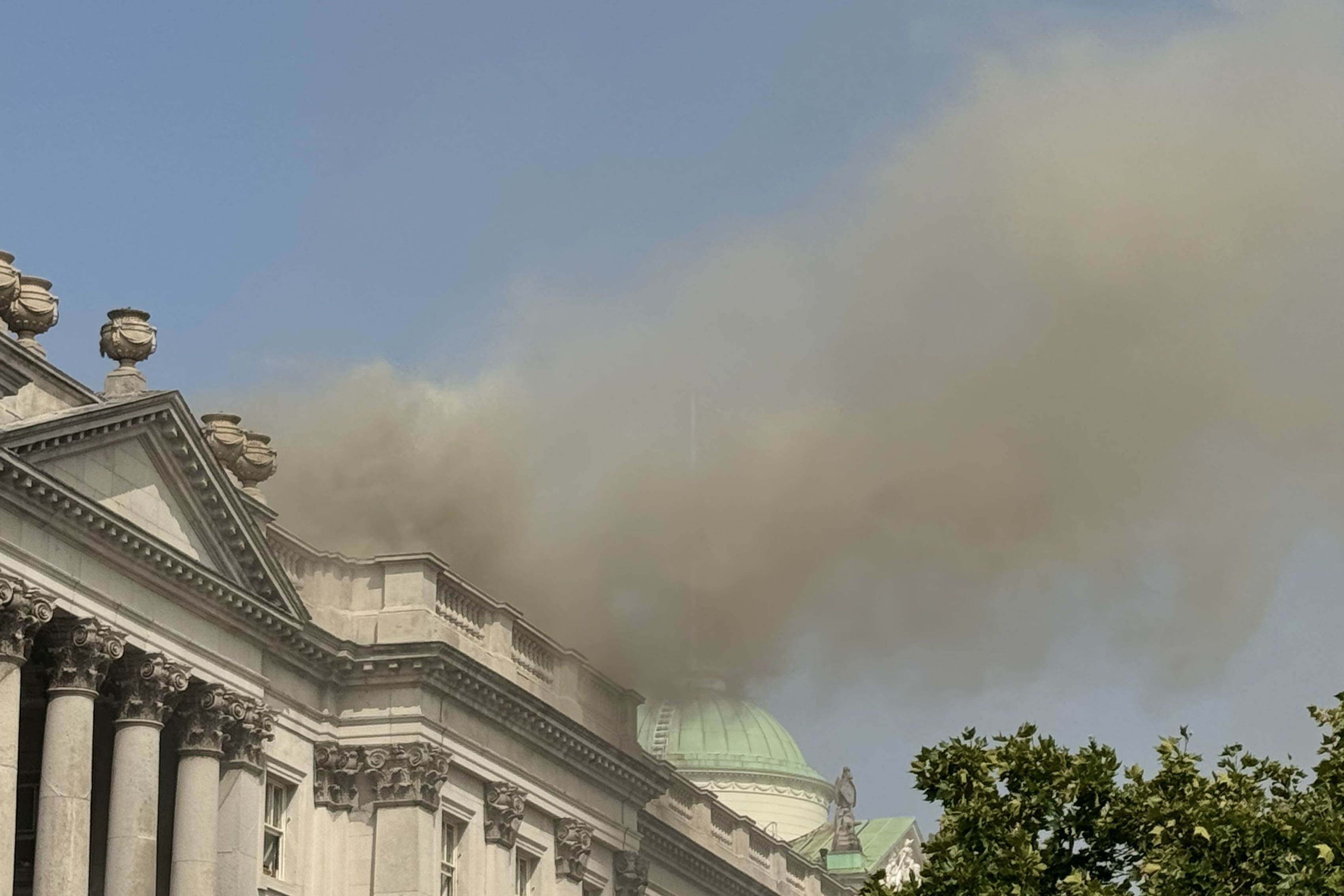 Smoke billowing out of the roof of Somerset House in central London (Shivansh Gupta/PA