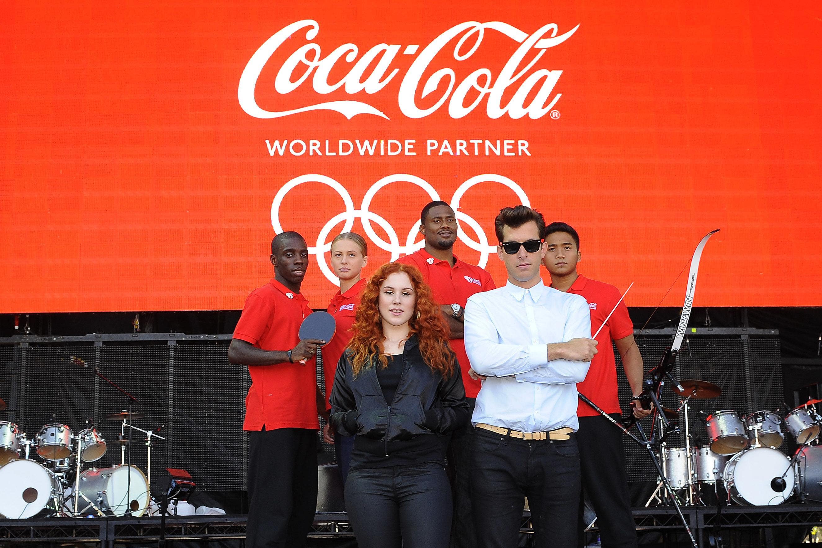 (left to right) Great British table tennis player Darius Knight, Russian 400m sprinter Kseniya Vdovina, singer Katy B, producer Mark Ronson, US 110m hurdler David Oliver and Singapore archer Dayyan Jaffar during the launch of Coca-Cola’s Olympic Global Campaign at Forman’s Fish Island, London (PA)