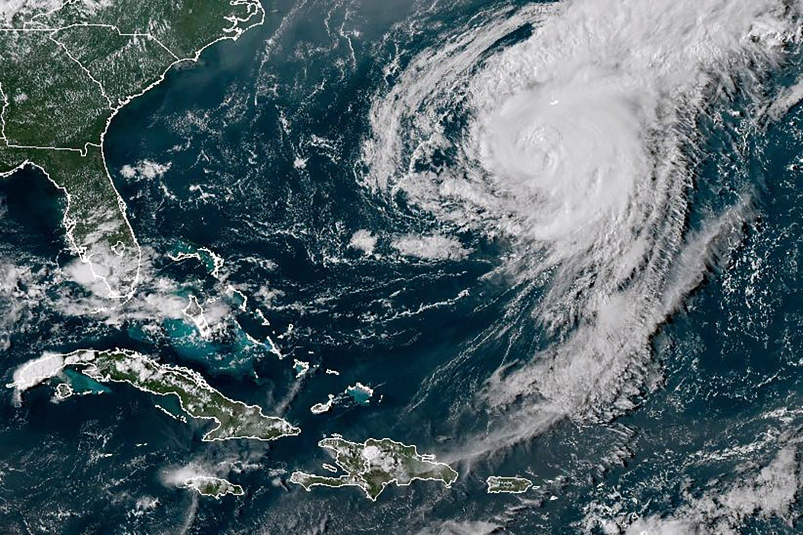 A satellite image shows Hurricane Ernesto in the Atlantic Ocean on Friday