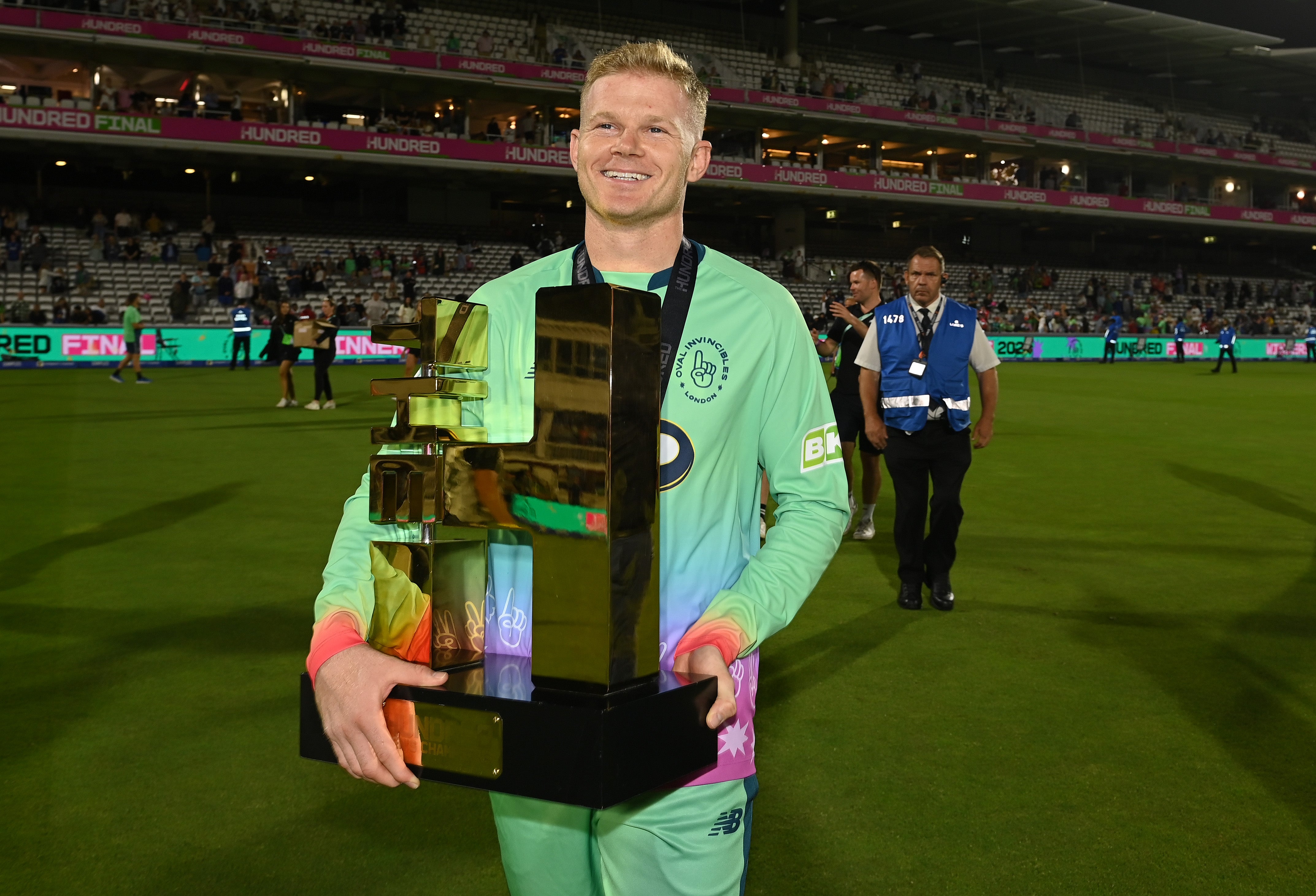 Sam Billingham holds the men’s Hundred trophy at Lord’s