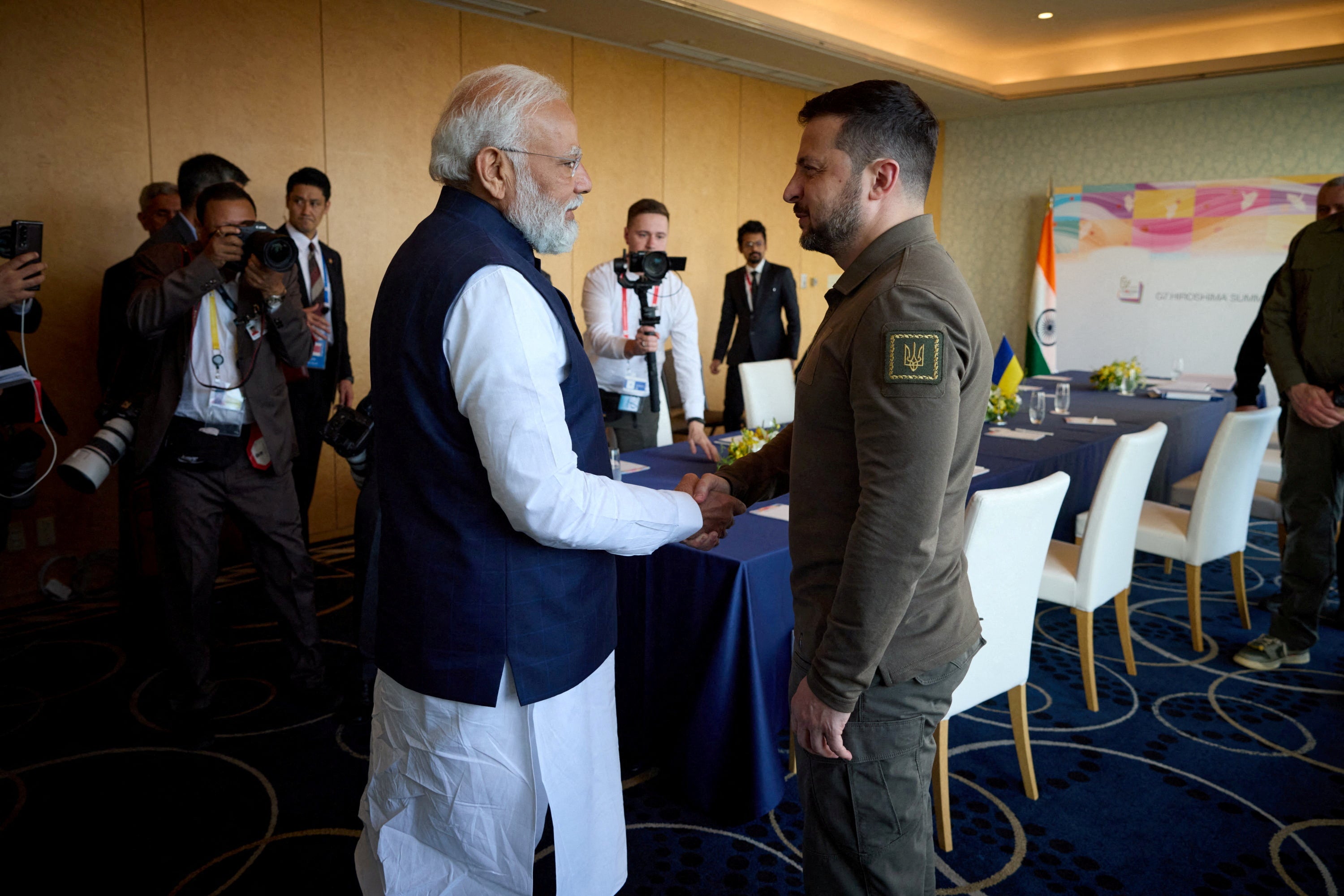 Vlodomyr Zelensky and Narendra Modi shake hands at the G7 summit in Hiroshima, Japan, last May