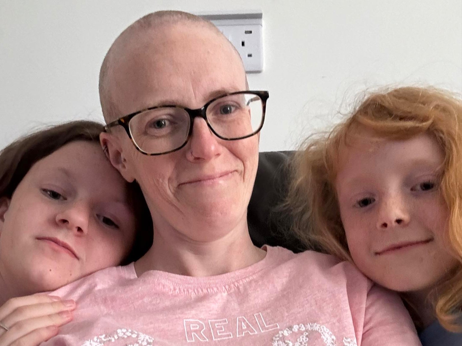 A mother-of-two has been diagnosed with a rare form of ovarian cancer after thinking her symptoms could have been down to pregnancy.