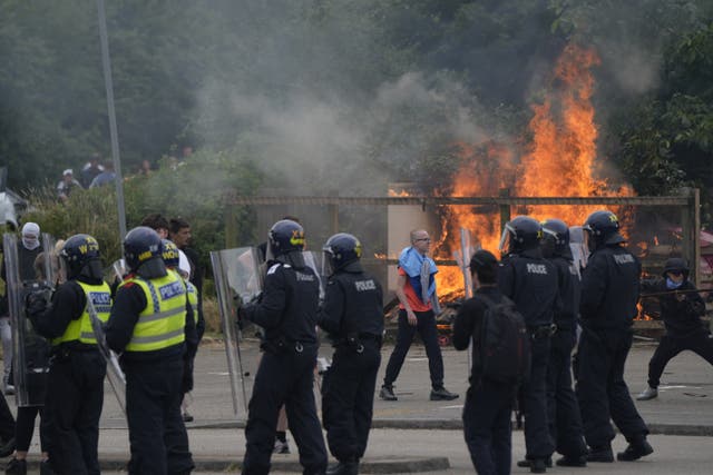 <p>Trouble flared during an anti-immigration demonstration outside the Holiday Inn Express in Rotherham, South Yorkshire on August 4 (Danny Lawson/PA)</p>