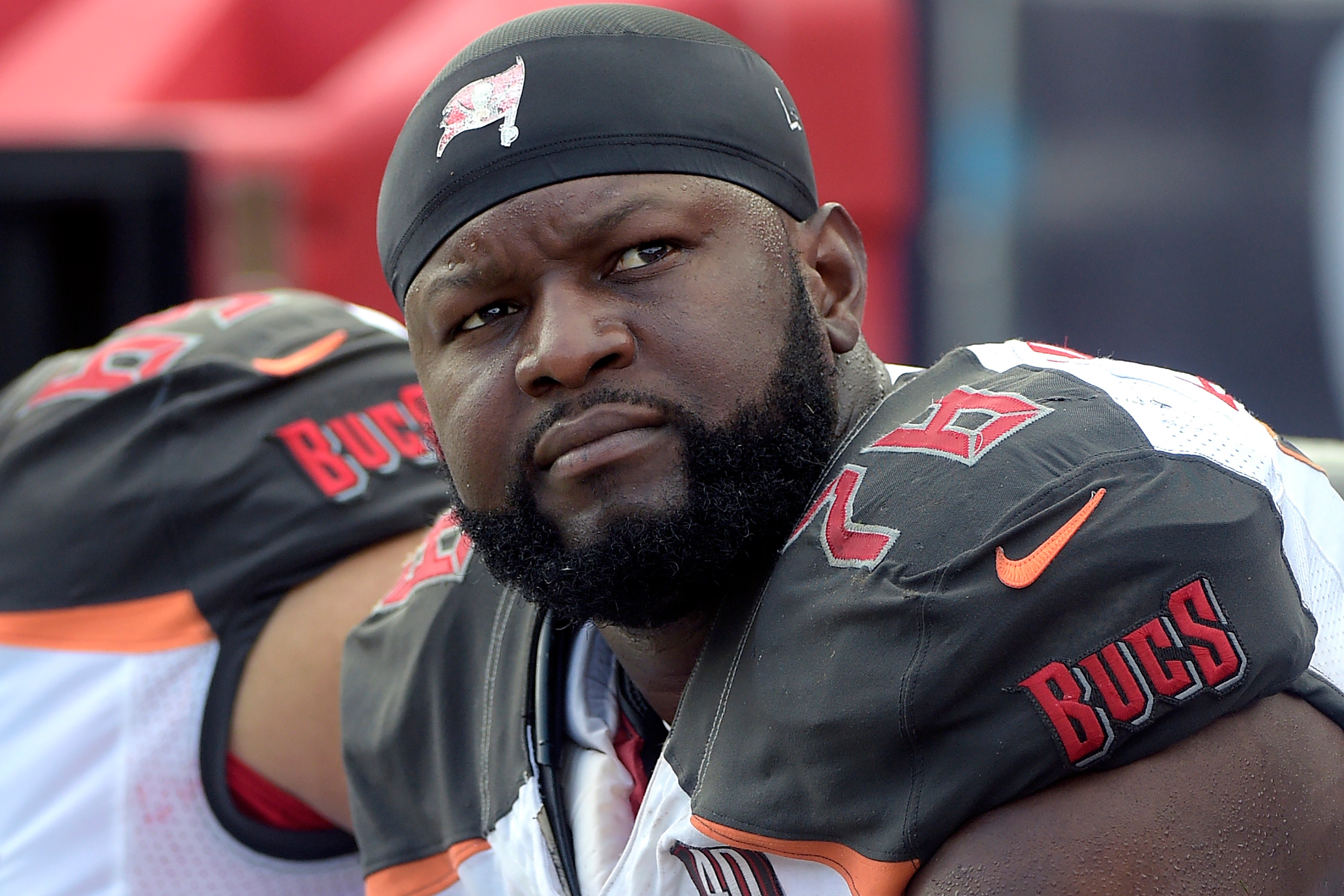 Gosder Cherilus, 40, a former NFL player, was taken into custody this weekend after urinating on a passenger during a Delta flight, cops say