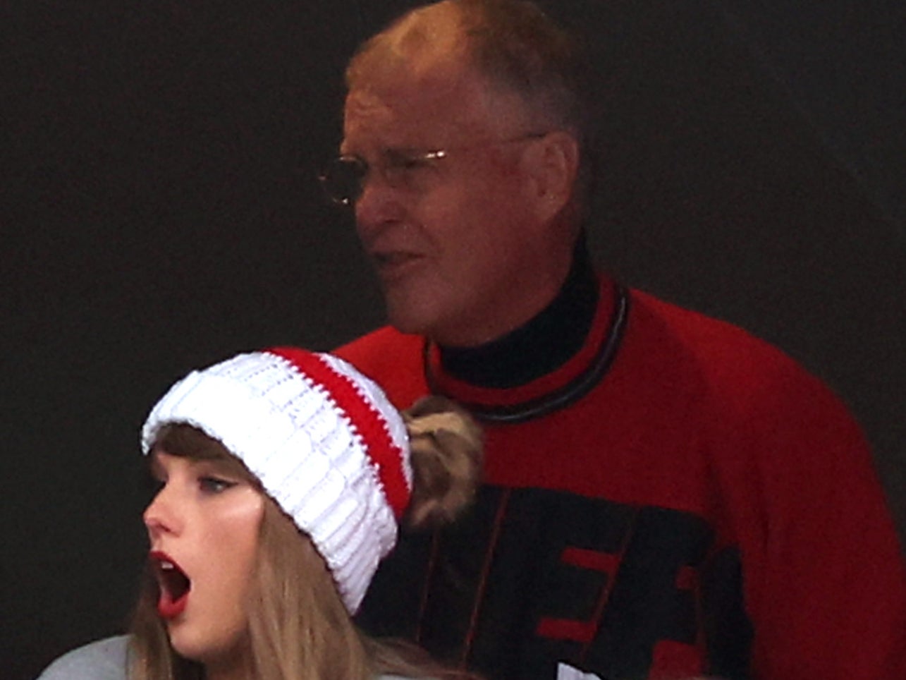 Scott Kingsley Swift hands chicken tenders to fans at his daughter’s Eras Tour in London