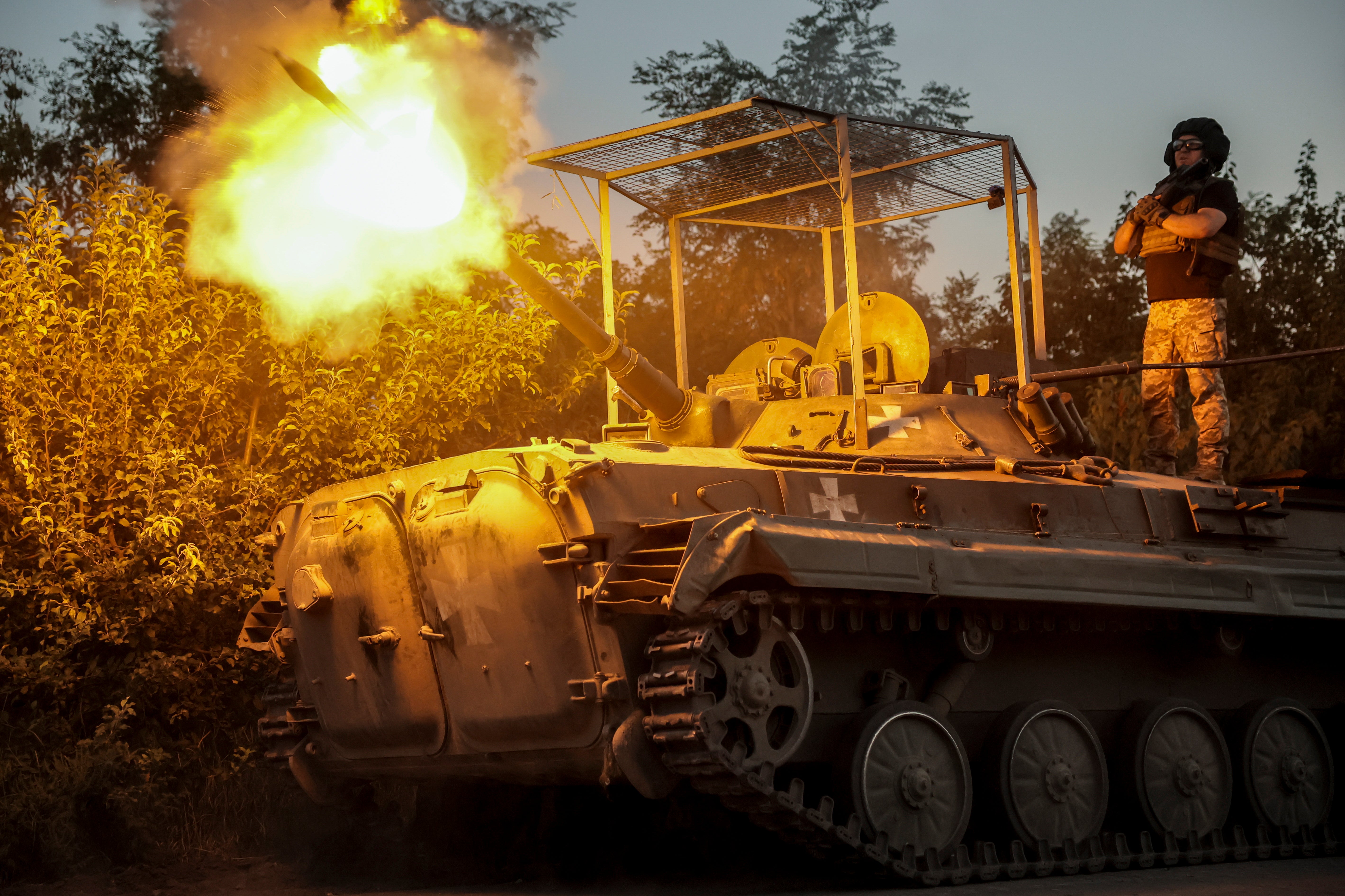 Ukrainian soldiers of the 24th Mechanized Brigade fire from BRM1K infantry fighting vehicle towards Russian positions near Chasiv Yar town, in Donetsk region