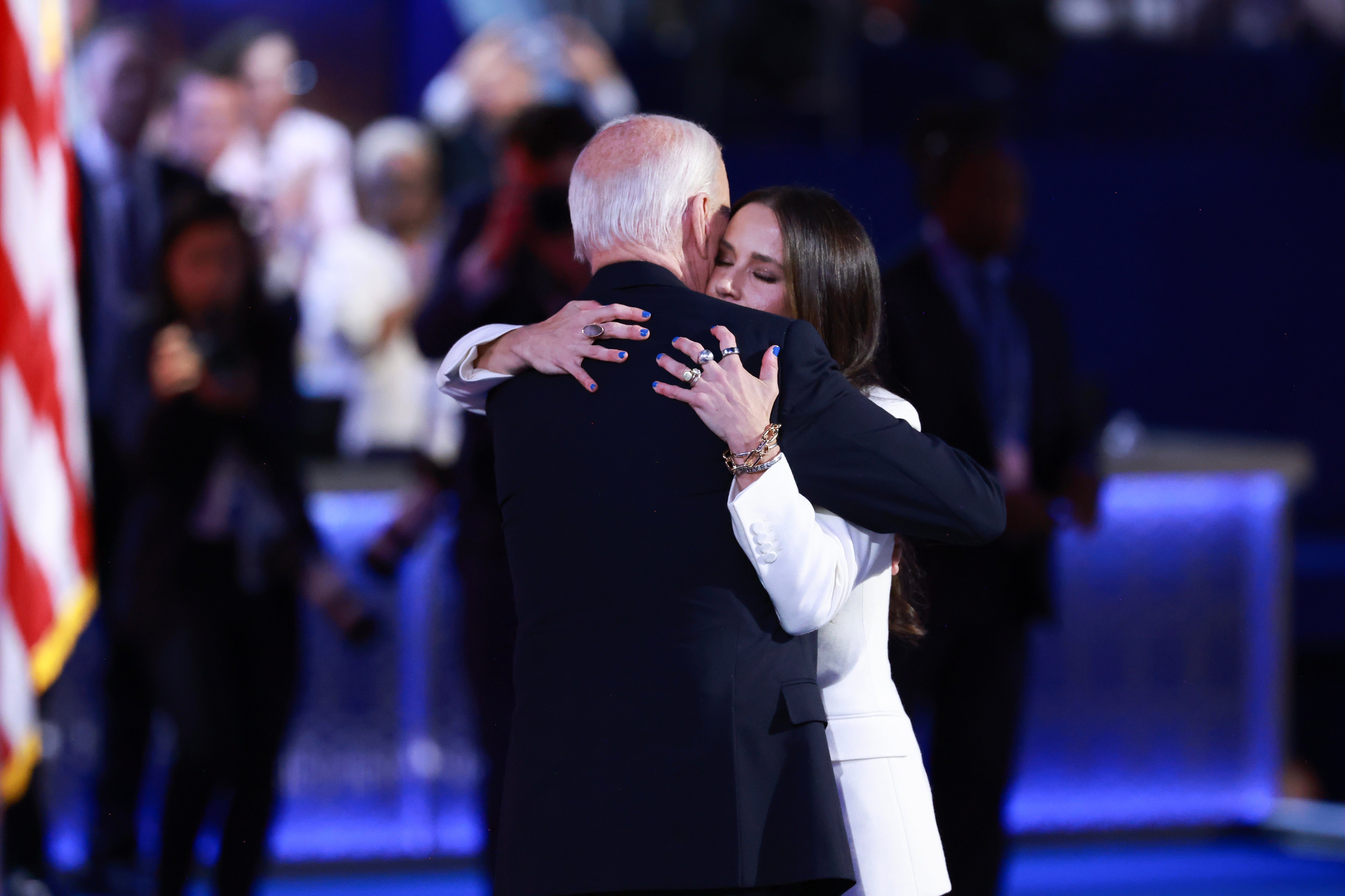 First daughter Ashley Biden and president Joe Biden embrace on stage at the Democratic National Convention in Chicago on August 19