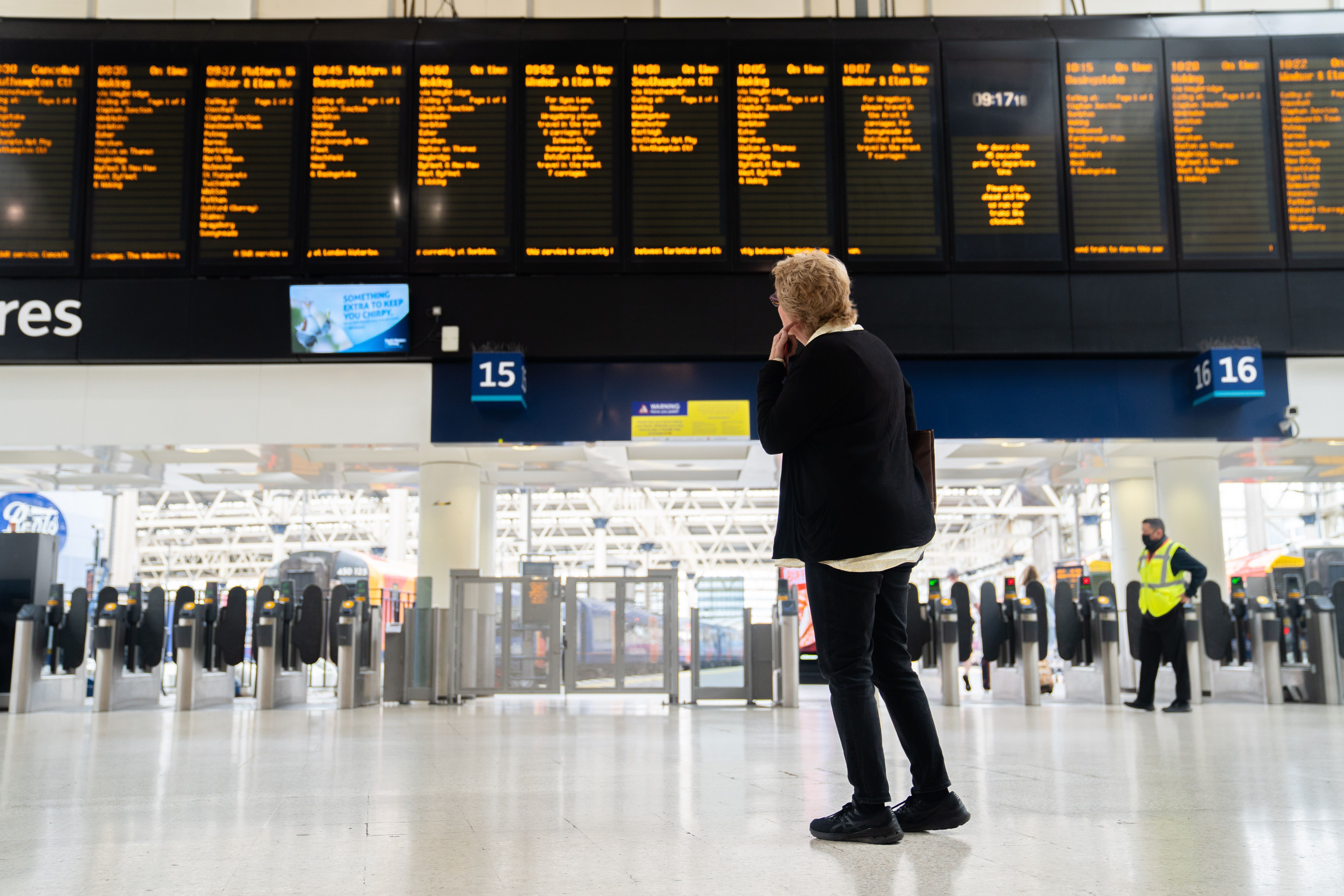 A passenger at Waterloo train station in London, during a strike by members of the Rail, Maritime and Transport union (PA)