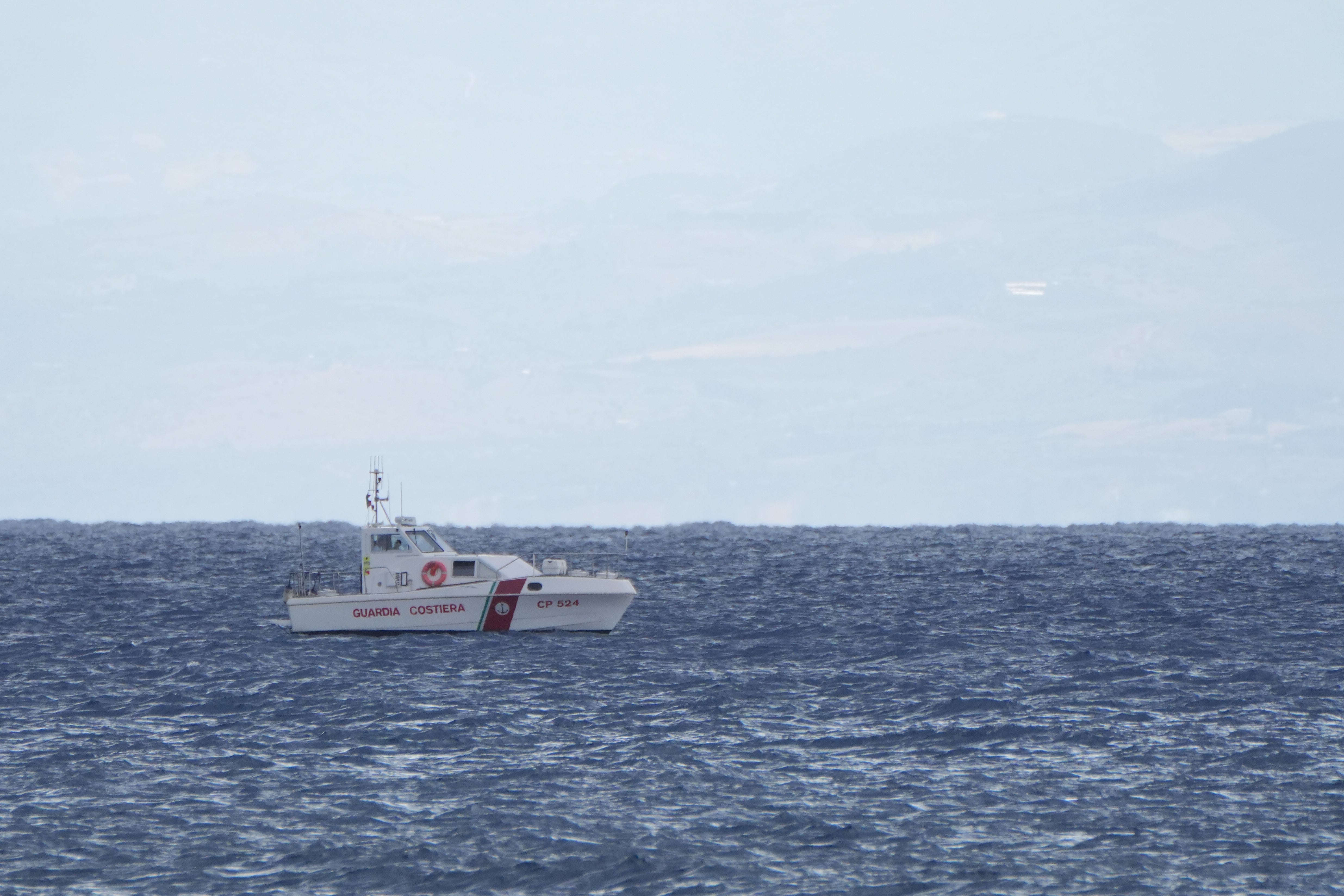 Italian emergency services pictured heading to the scene