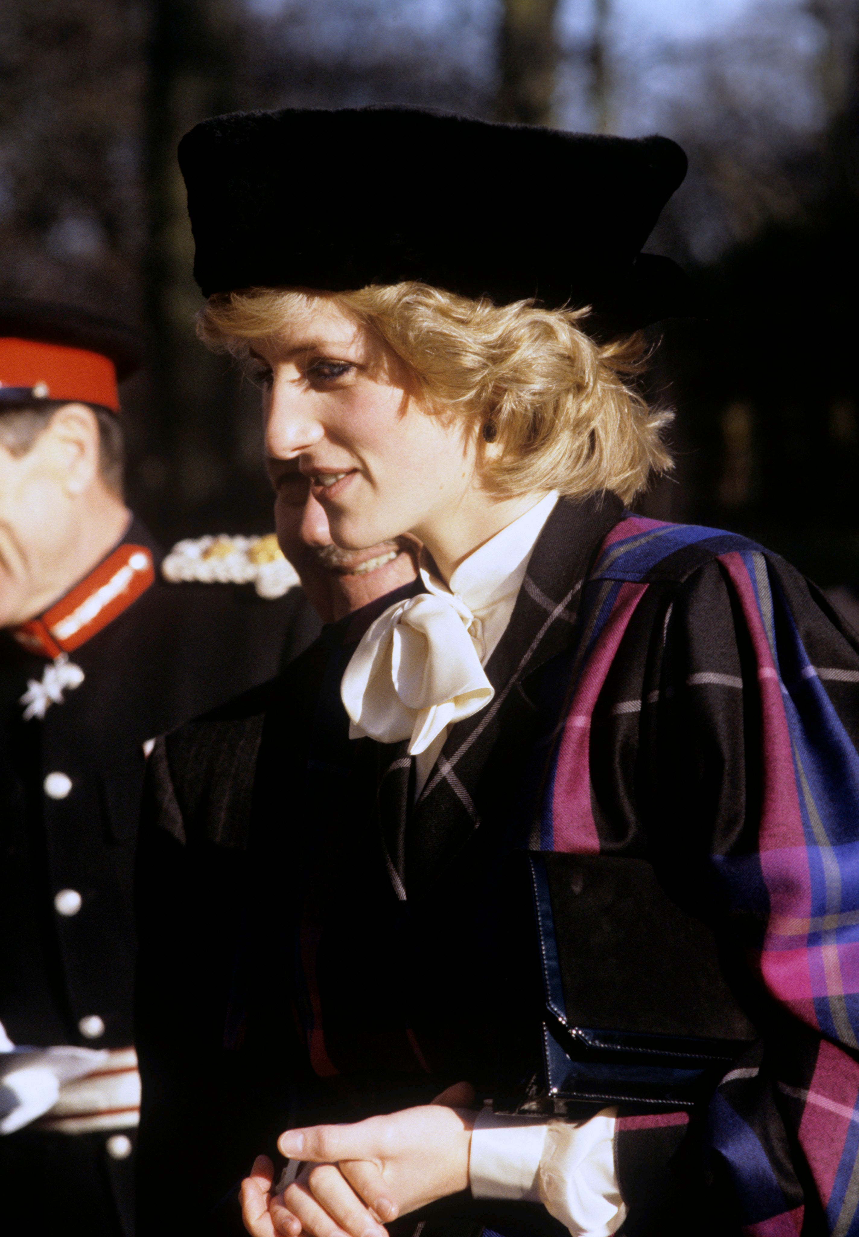 Diana, Princess of Wales, frequently sported pussybow blouses and tartan blazers during public outings (PA Archives)