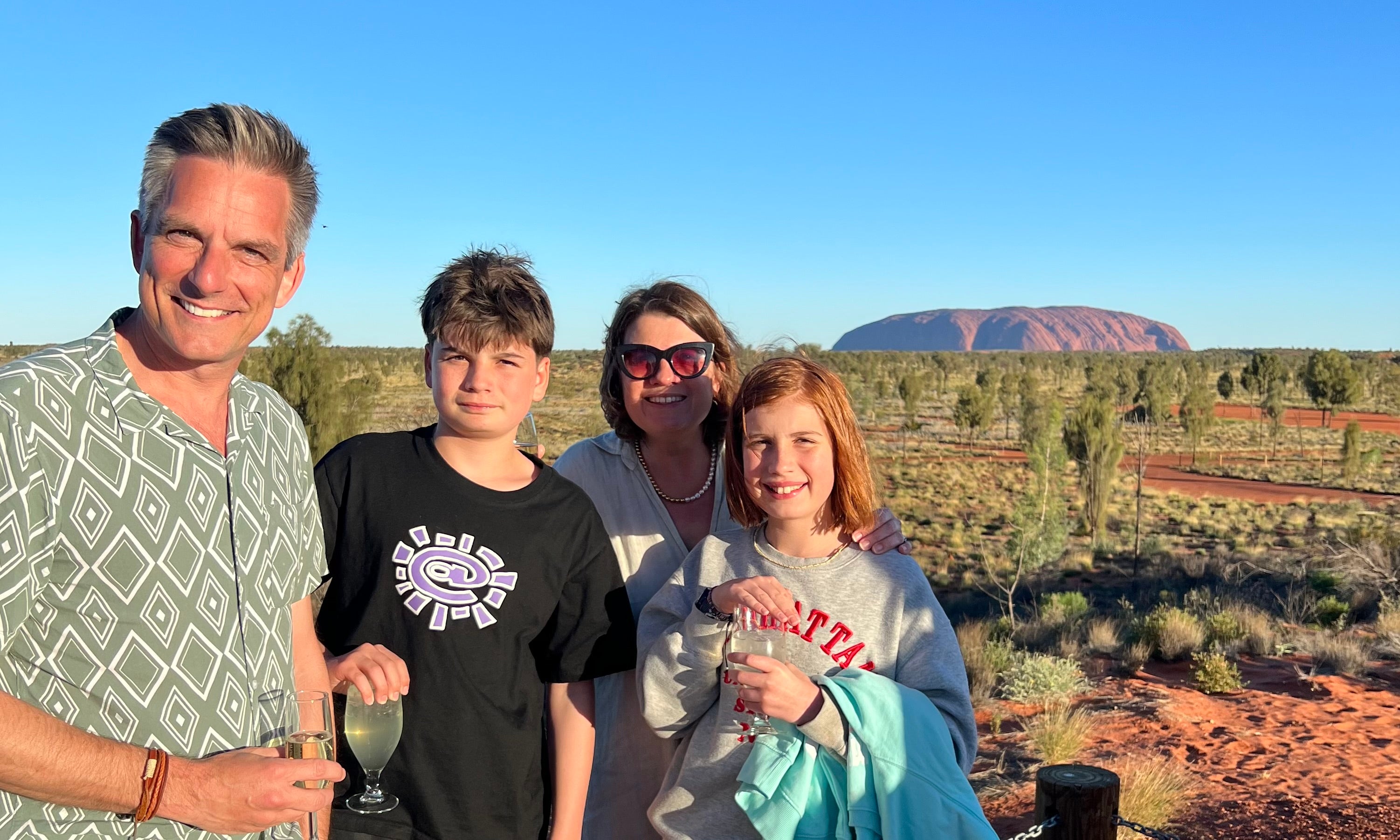 Jonathan Samuels and his family enjoying the majesty of Uluru