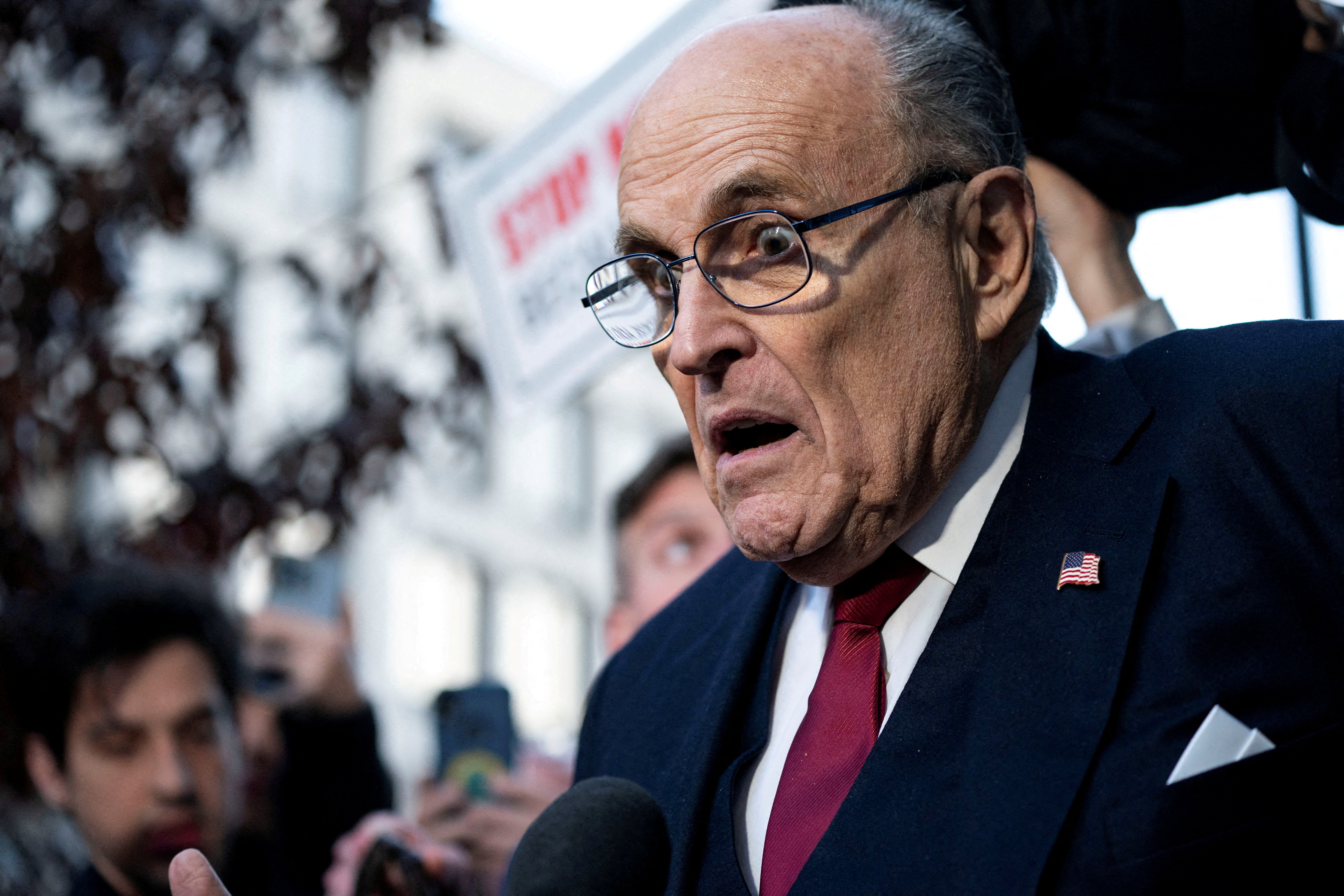 Former New York Mayor Rudy Giuliani departs the U.S. District Courthouse after he was ordered to pay $148 million in his defamation. At a Wednesday court hearing with a sexual assault accuser, Giuliani launched into personal attacks and was confused at his representation