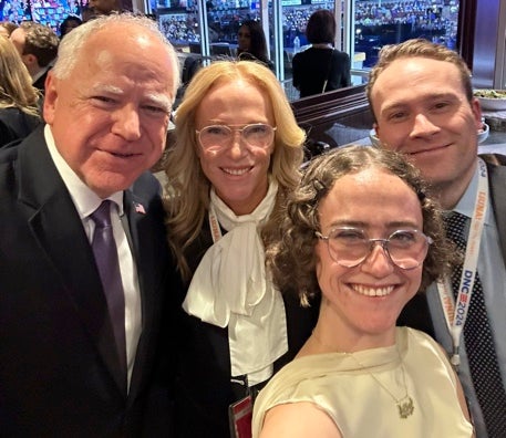 Harris’s running mate Tim Walz (left) poses with Kerstin Emhoff (center), Ella Emhoff and Cole Emhoff.