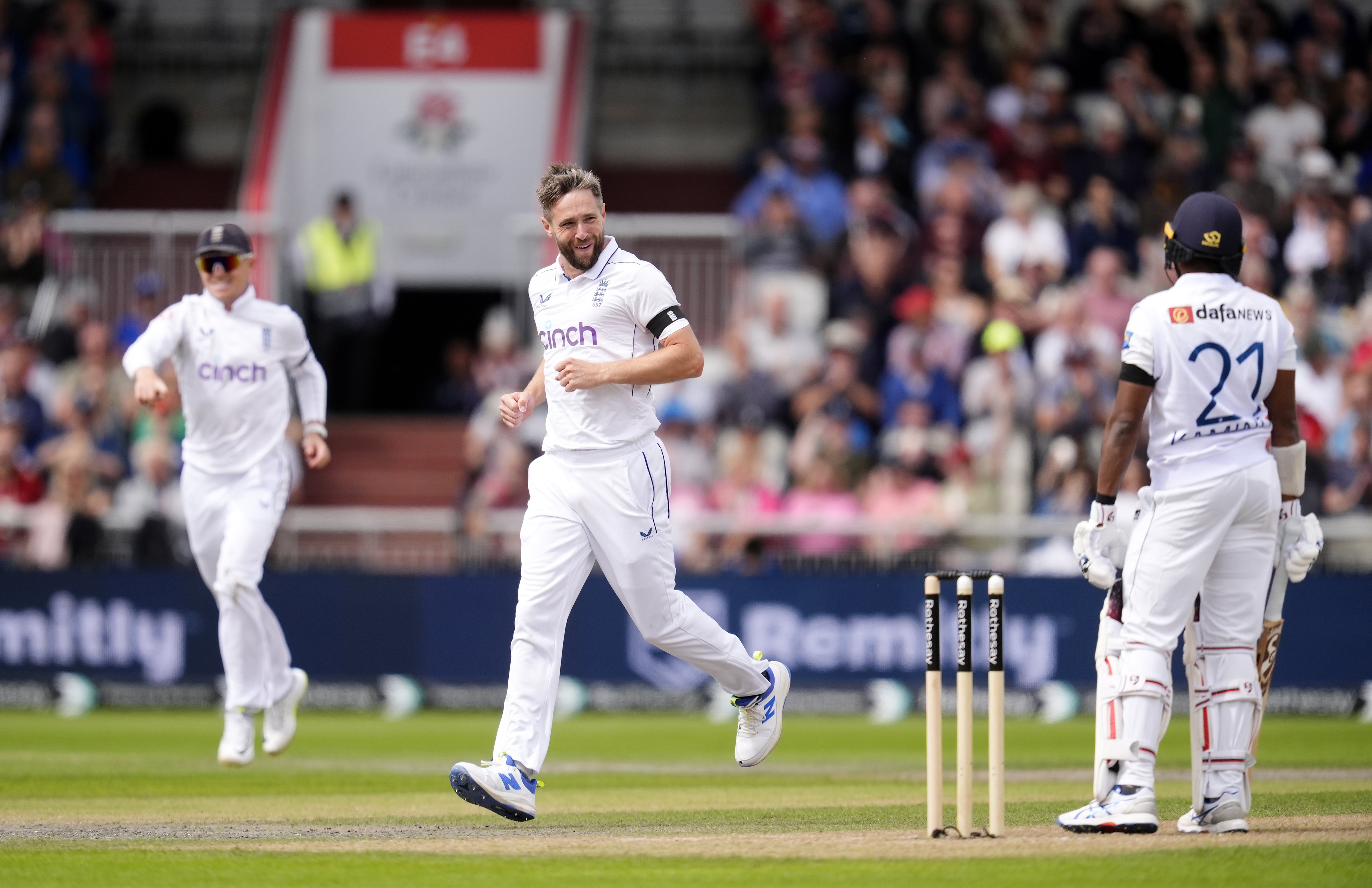 England’s Chris Woakes celebrates taking the wicket of Sri Lanka’s Kamindu Mendis