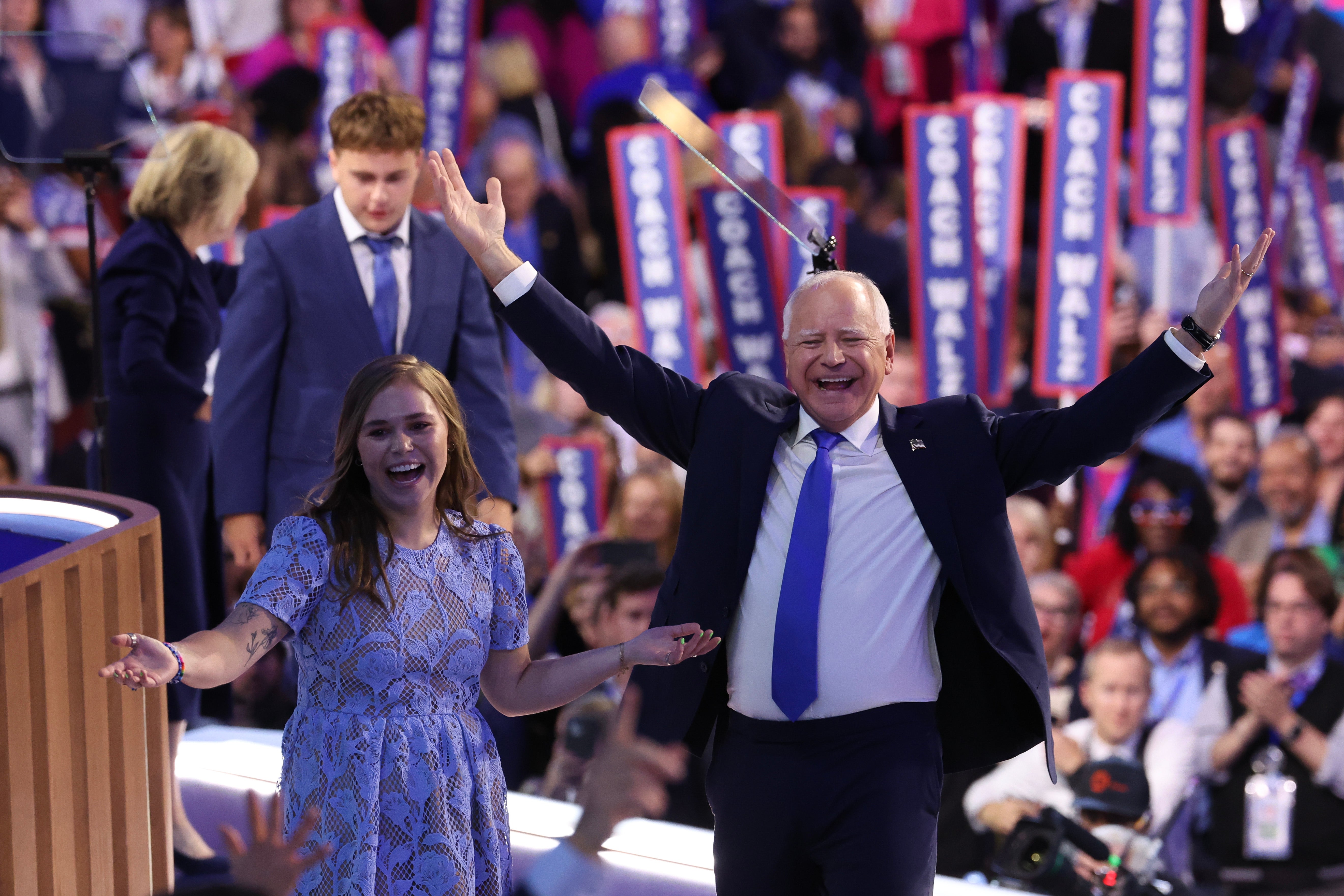 Tim Walz reacts with his daughter Hope Walz after accepting the Democratic vice presidential nomination in Chicago on August 22.