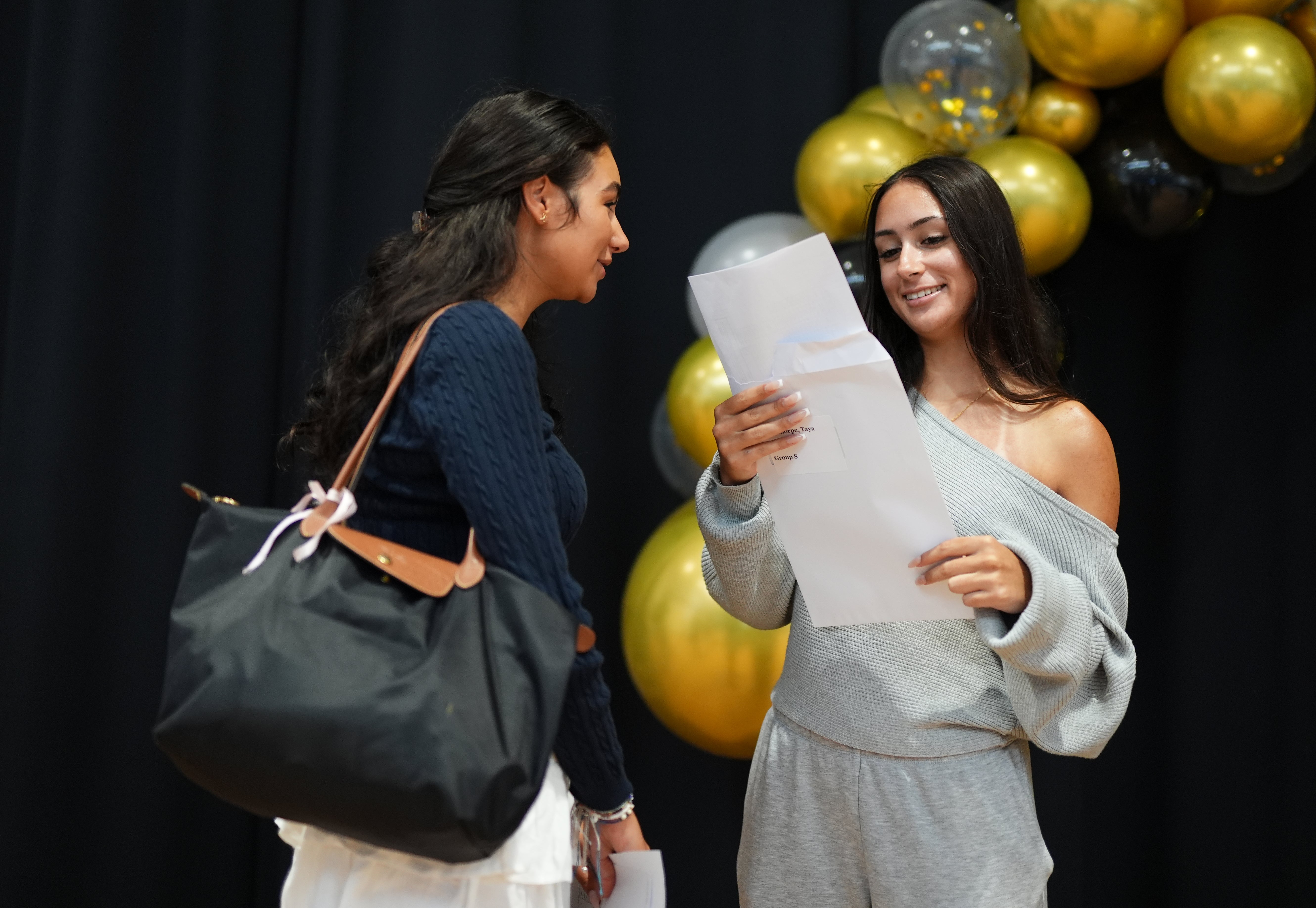 Taya Manthorpe receiving her GCSE results at the Ark Pioneer Academy in Barnet