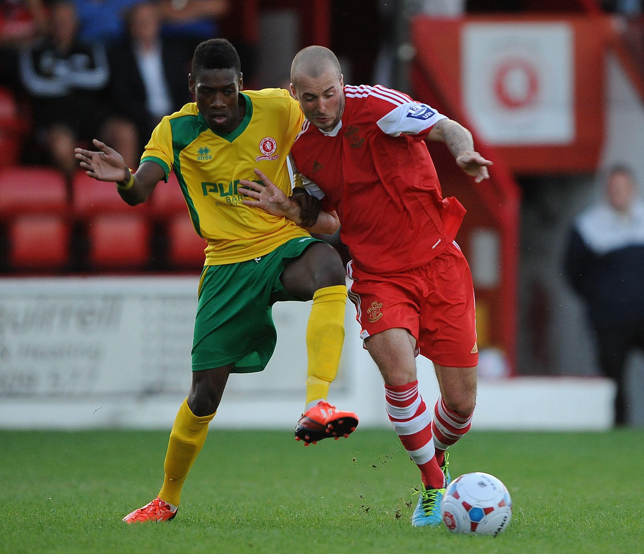 Kiernan Hughes-Mason (left) playing for Welling United, competing with Southampton’s Steve De Ridder