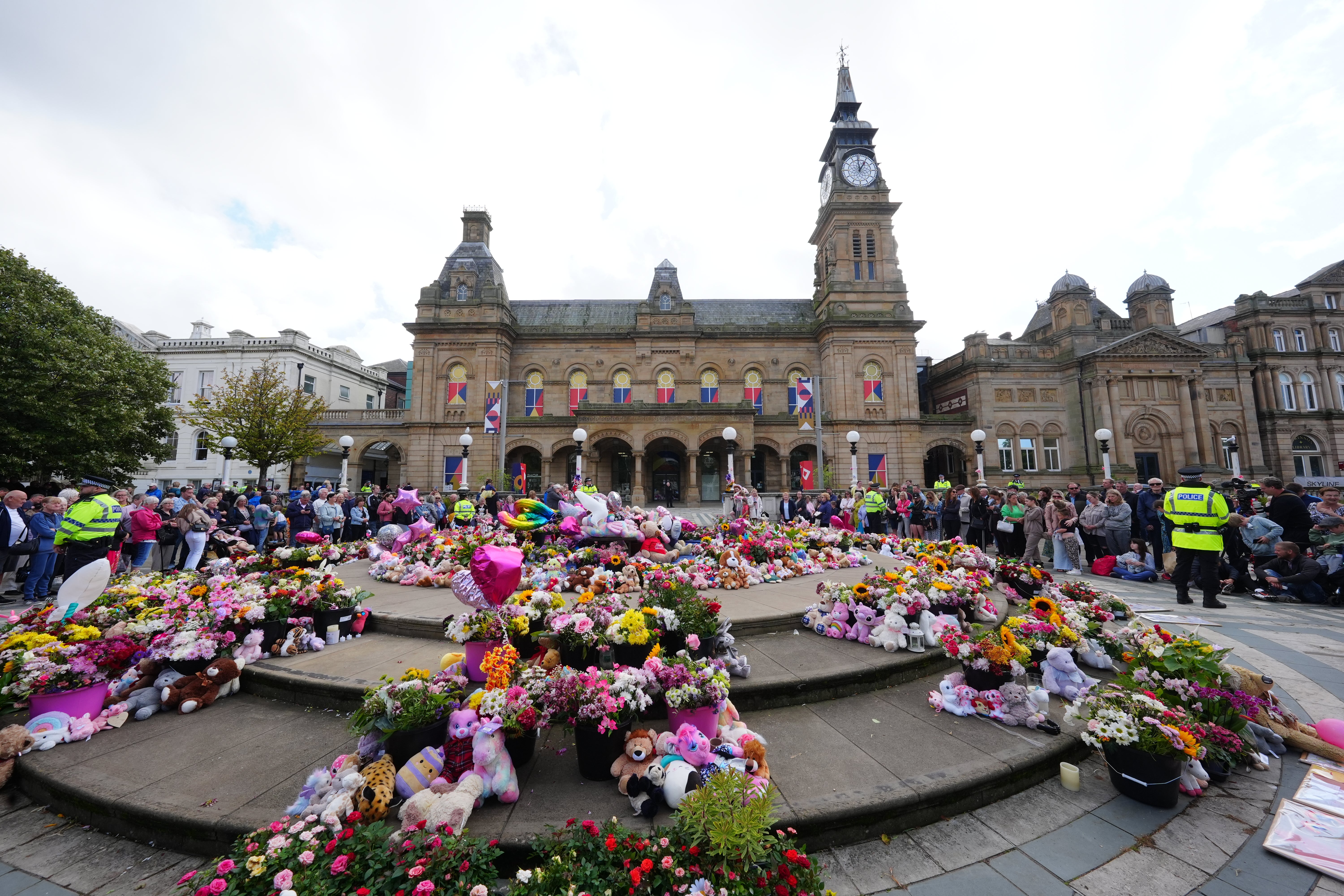 Flowers outside the Atkinson Art Centre following the July 29 knife attack (Owen Humphreys/PA)