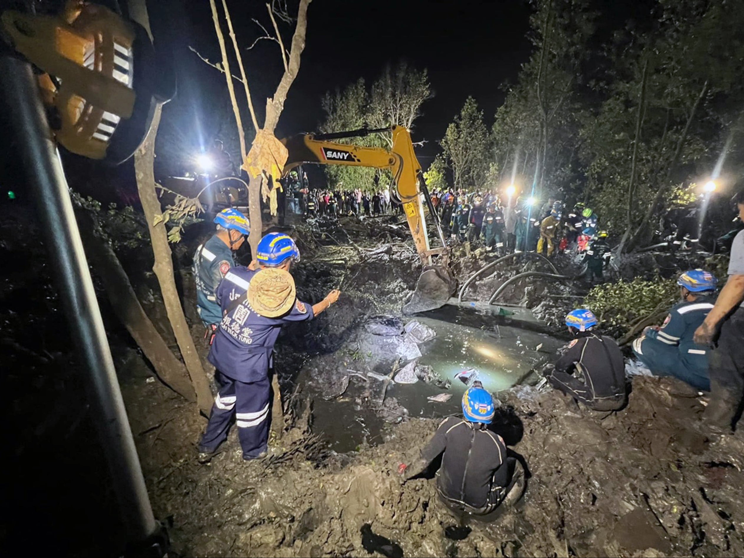 A small plane with nine people on board was found in the mud after it crashed in a mangrove forest in Chachoengsao province in Thailand