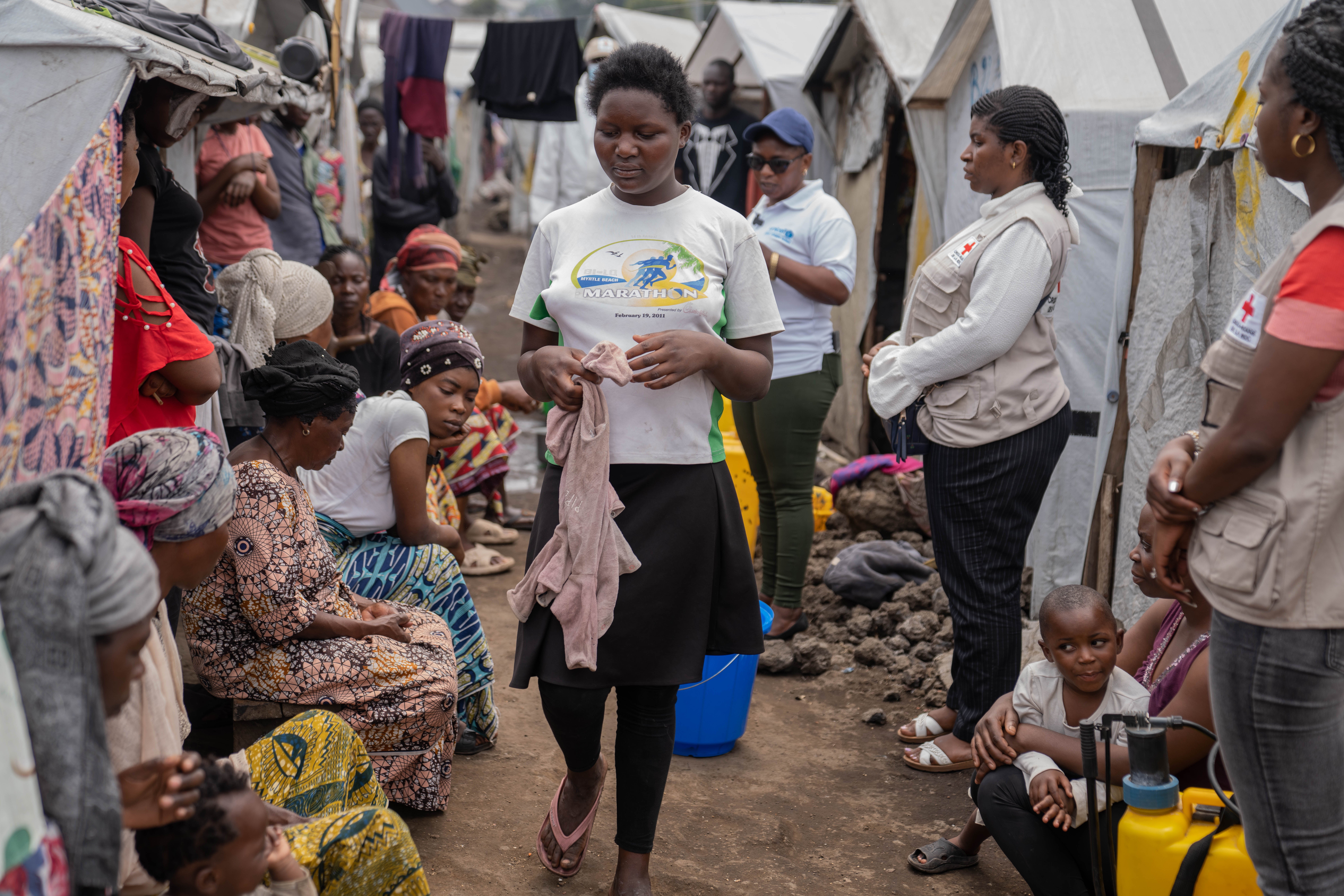 Red Cross workers raise awareness about mpox and hygiene among internally displaced people in the Don Bosco camps in Goma